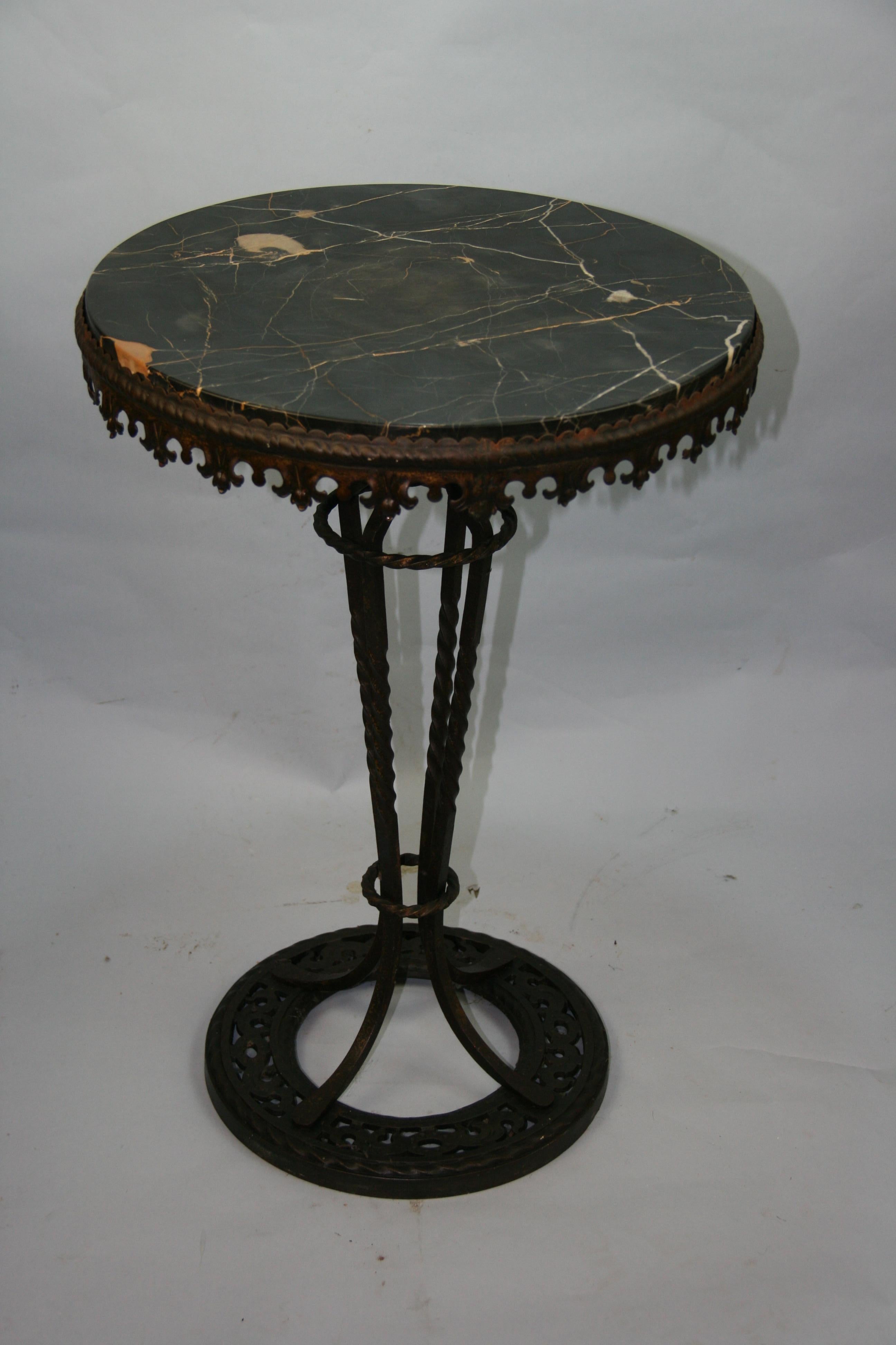 Victorian iron and marble pedestal/side table
Measures: Base diameter 11