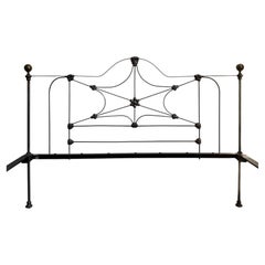 Victorian Iron Bed Frame with Brass Finials and Decorative Design, England 1800s