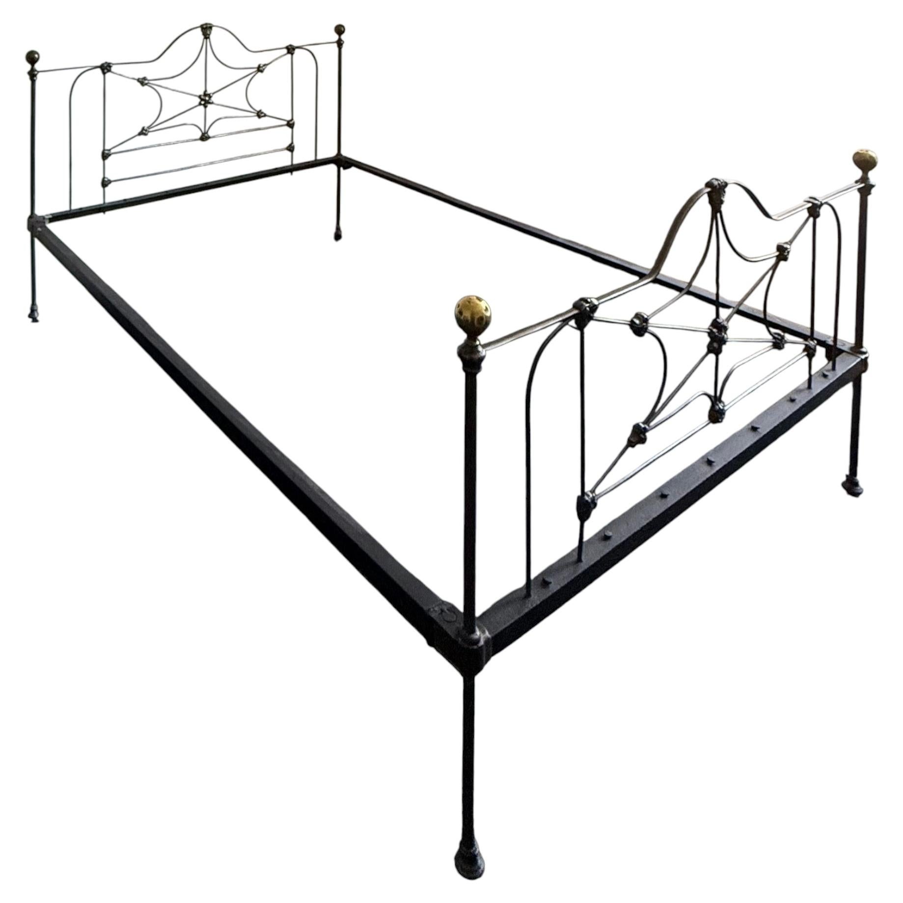 Victorian Iron Bed Frame with Brass Finials and Decorative Design, England 1800s