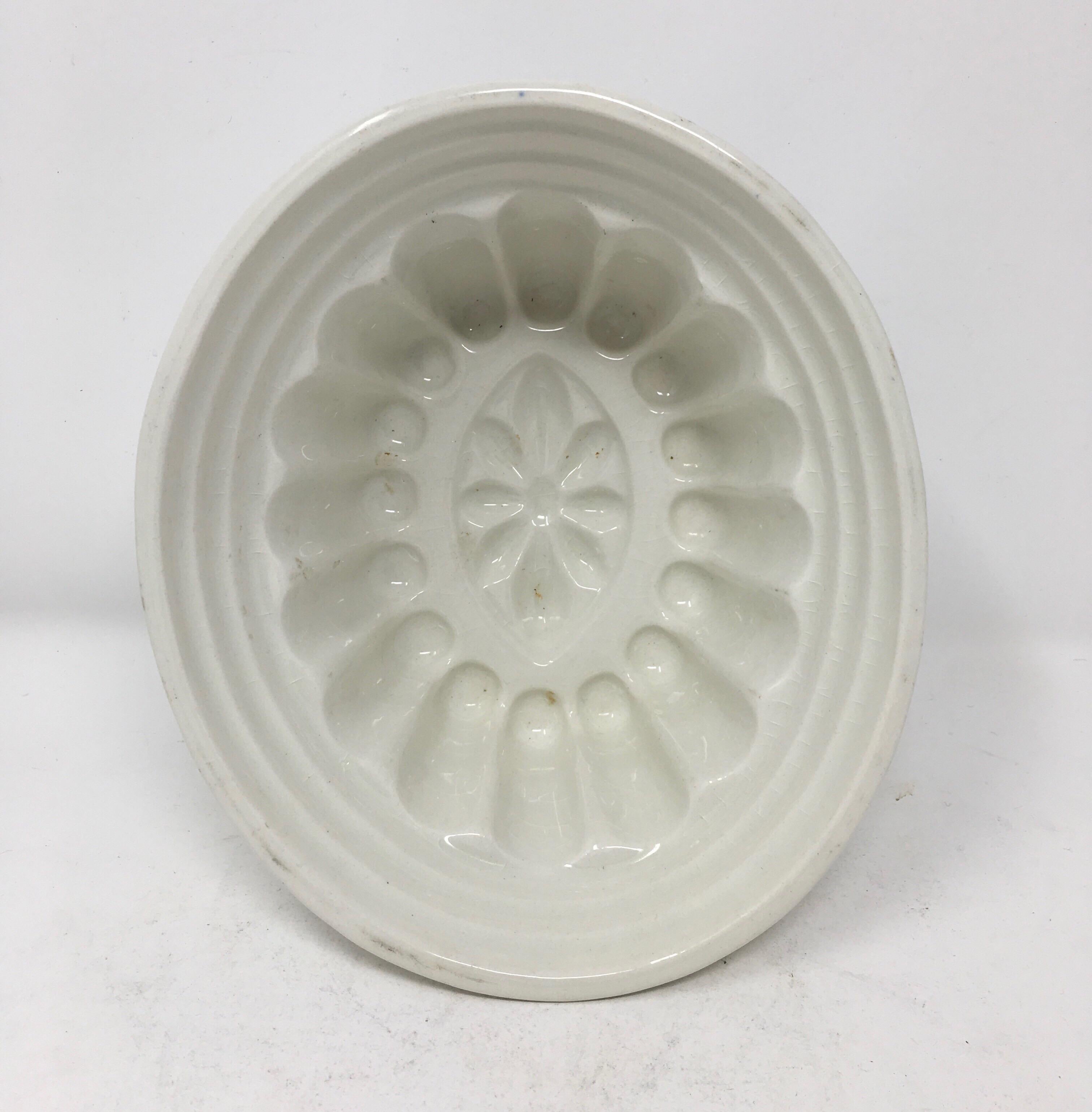 This Victorian Ironstone Mold with a charming floral motif, was used to mold several different food items such as jellies, aspic, meat and puddings into beautiful shapes served on a platter. The ornate pattern within the bowl would appear on the