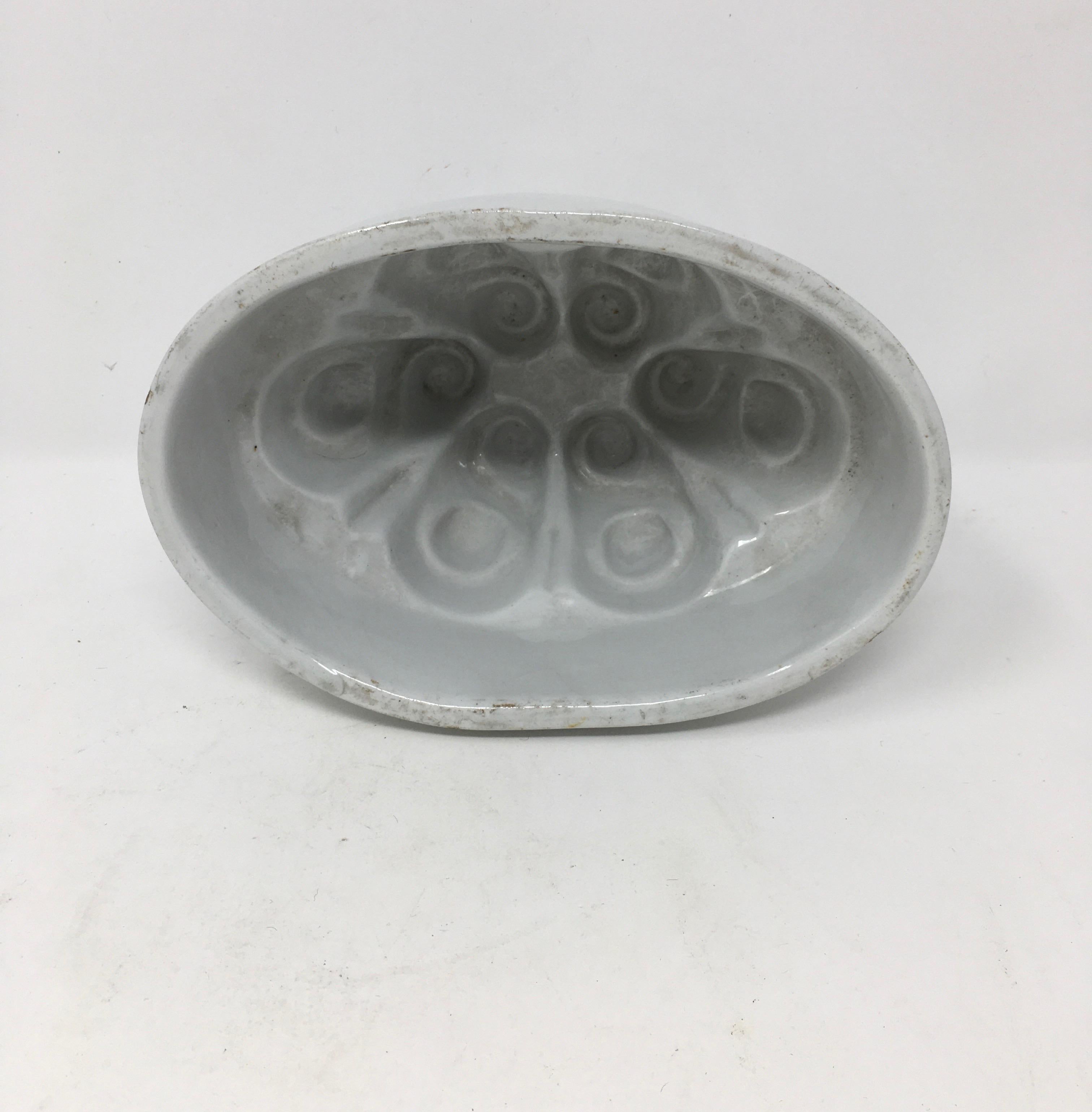 This Victorian ironstone mold was used to mold several different food items such as jellies, aspic, meat and puddings into beautiful shapes served on a platter. The ornate pattern within the bowl would appear on the exterior of the jelly or pudding