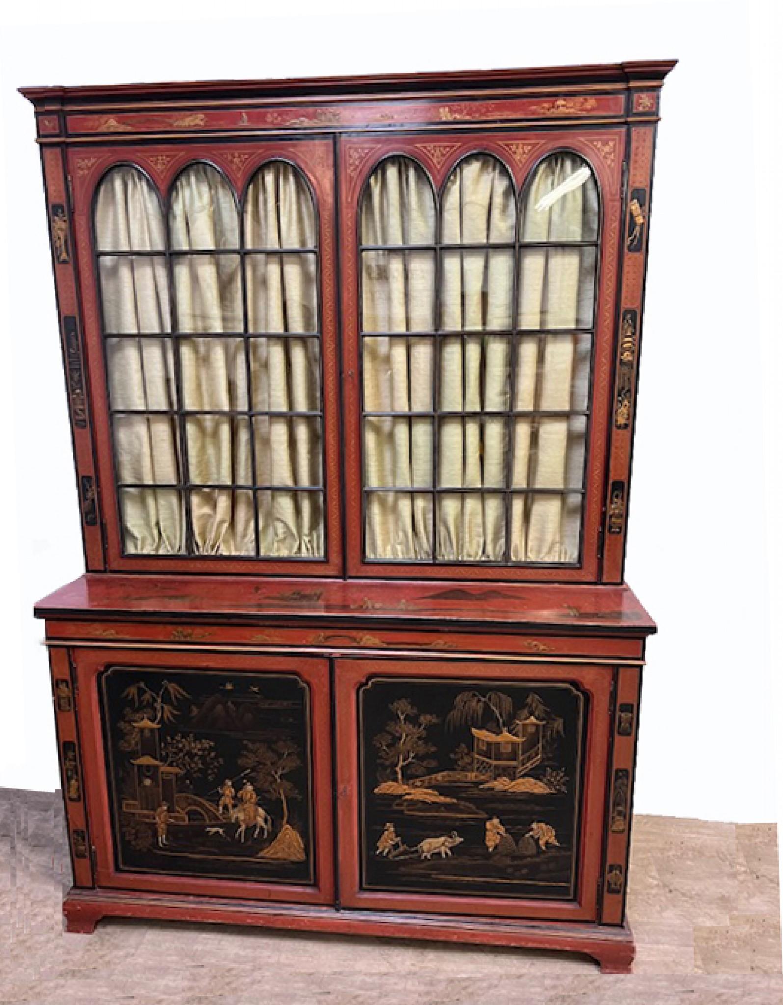 You are viewing a gorgeous antique English library bookcase in eye catching red lacquer
Such a great look to this important piece which we date to 1880
The cabinet features intricate Chinoiserie on all surfaces but it's particularly eye catching