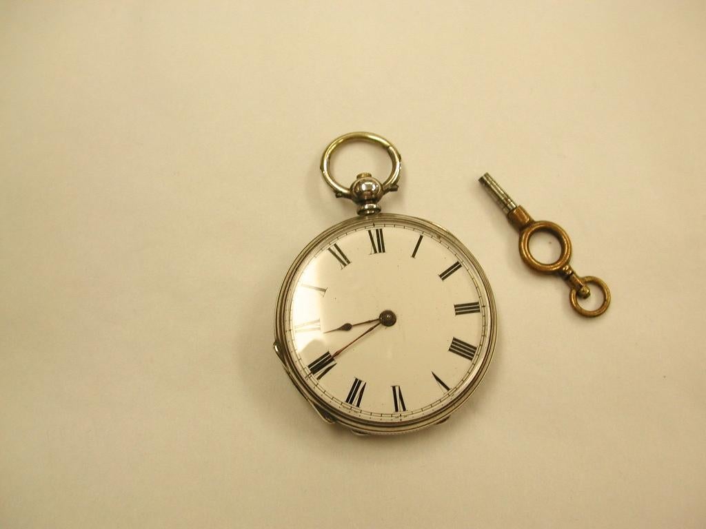 Victorian Ladies Silver Pocket Watch dated circa 1890,Swiss Movement.
Watch face and silver engine turned back are in very good condition as is the movement.
It has a separate silver inside case to protect the movement.
This watch was  traditionally