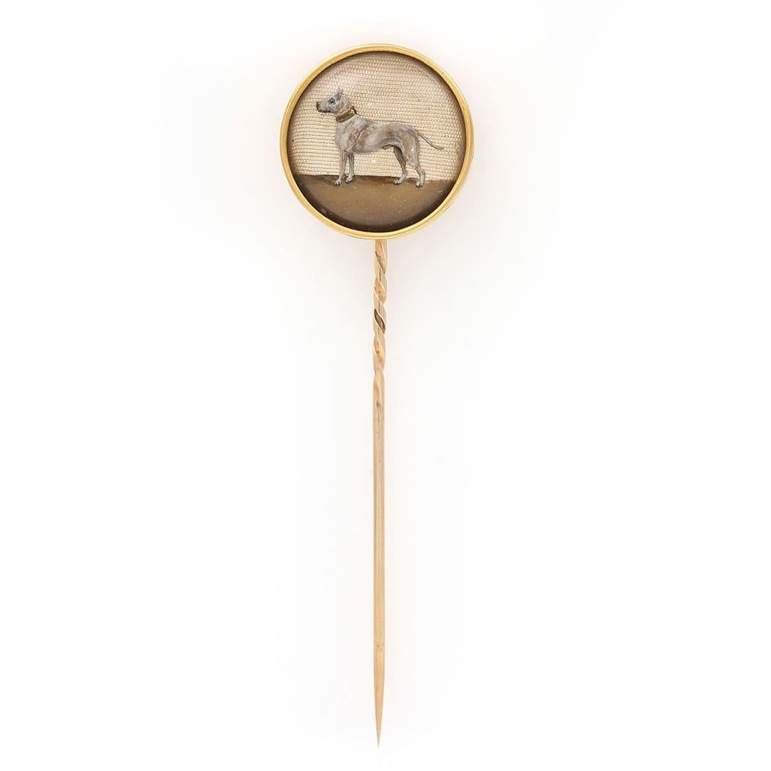 A special large Victorian 15ct gold Essex crystal stick pin which will have you going ‘mutts’ with excitement. Dating from the late 19th century the masterfully hand painted reserve painted crystal depicts a ‘paw-geous’ and adorable white coated