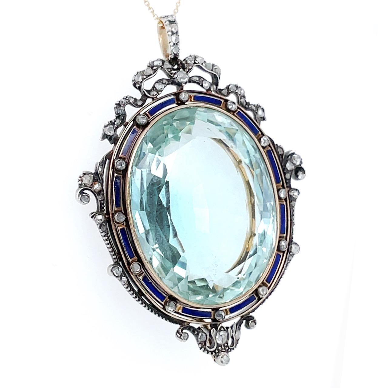 Victorian Aquamarine and Diamond Pendant, ca. 1860s

A large aquamarine pendant from the Victorian era (ca. 1860s). The aquamarine weighs ca. 75 carats and has a sea blue color and is almost inclusion free. It is surrounded by a ribbon designed