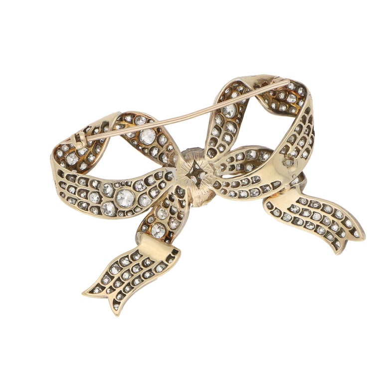 Women's or Men's Victorian Large Diamond Bow Ribbon Brooch Set in Silver on Gold For Sale