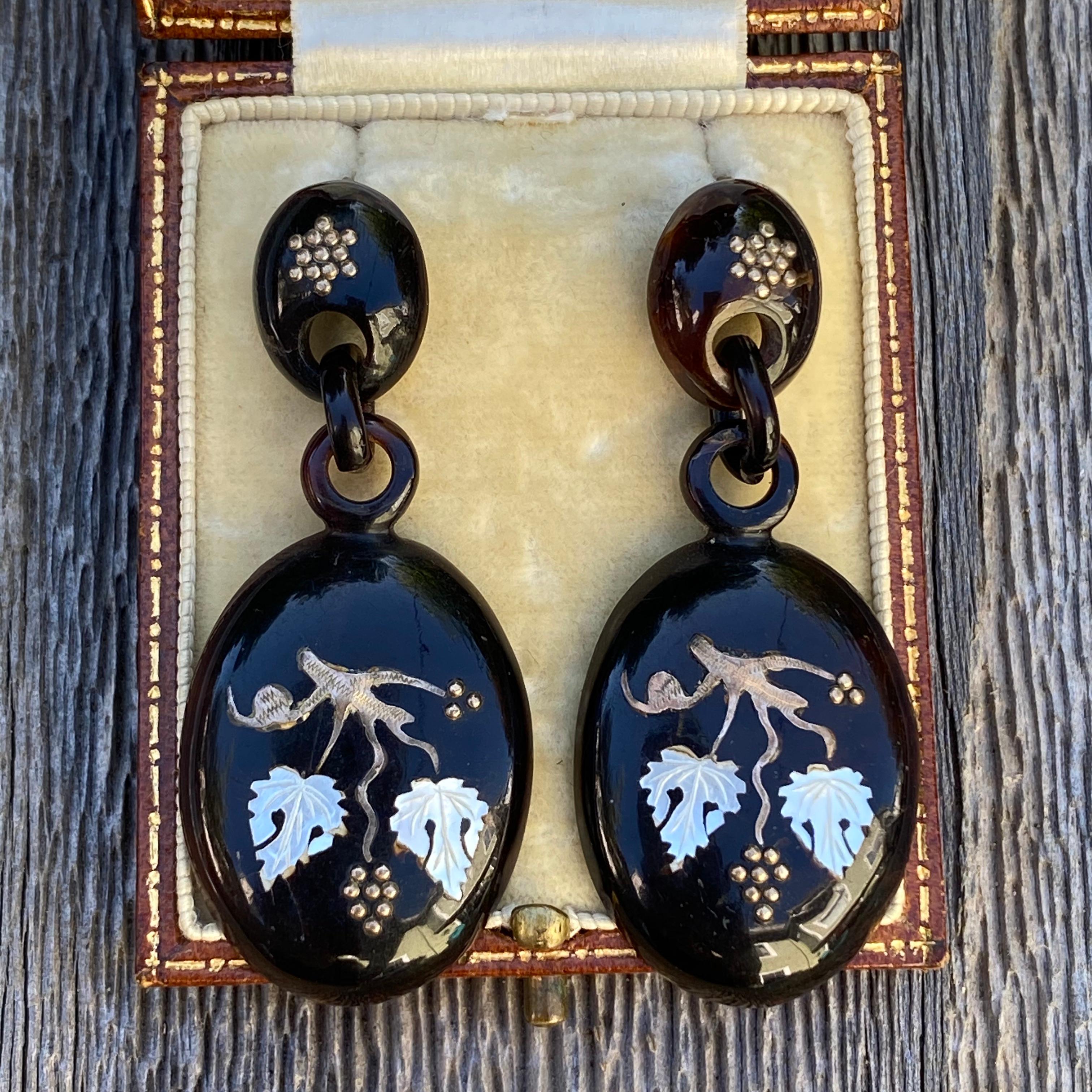 Details: 
Stunning Victorian detailed inlay earrings with 9K gold and shell details. These earrings are magnificent, and very dramatic. They have etched gold inlay with sweet grape vine pattern. The grapes are made of tiny gold beads, the vines are