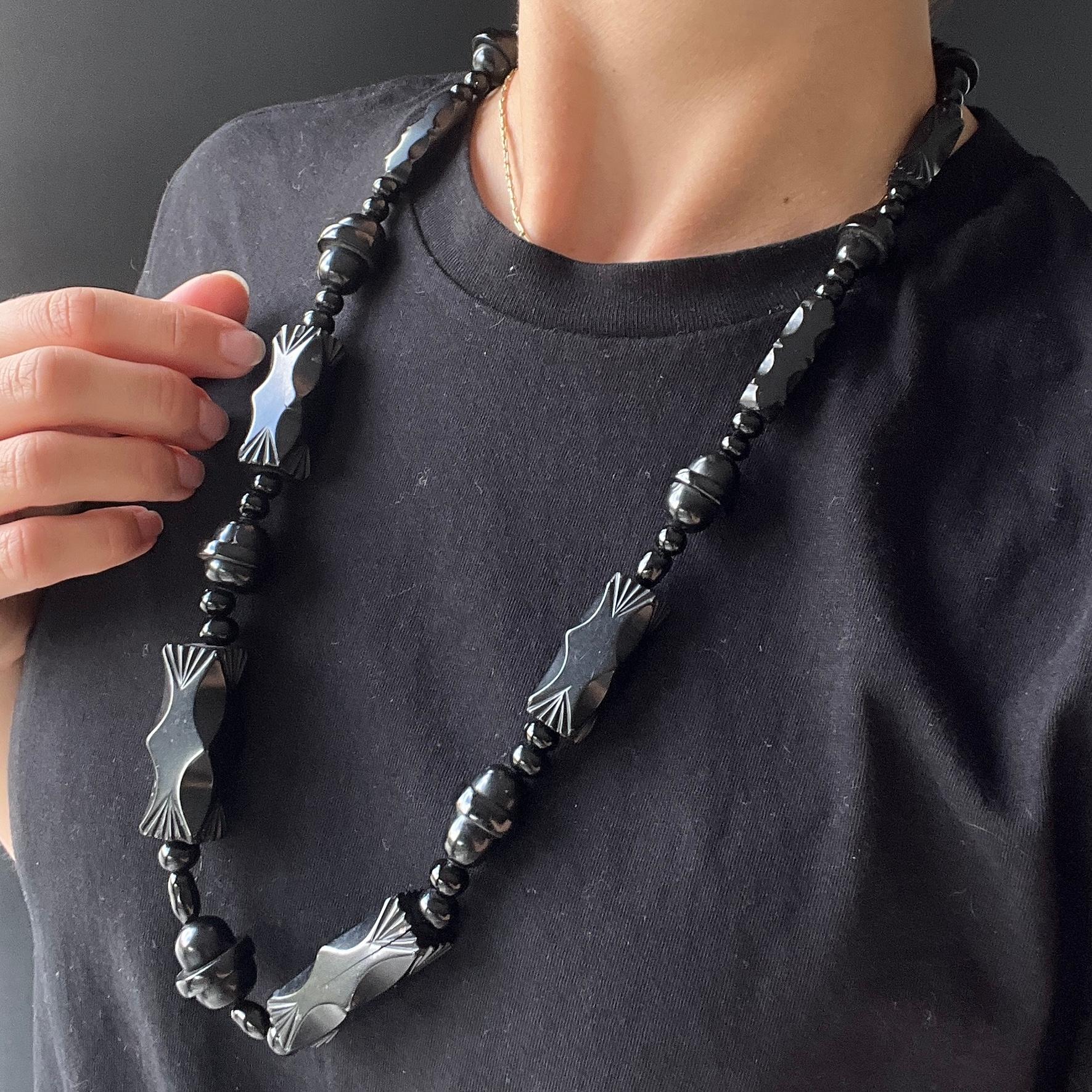 This stunning chunky necklace is a complete loop and does not have a clasp. The beads graduate in size, starting large at the centre and the smallest on the outer edges. 

Length: 70cm 
Largest Bead Dimensions: 42x16mm
Smallest Bead Dimensions: