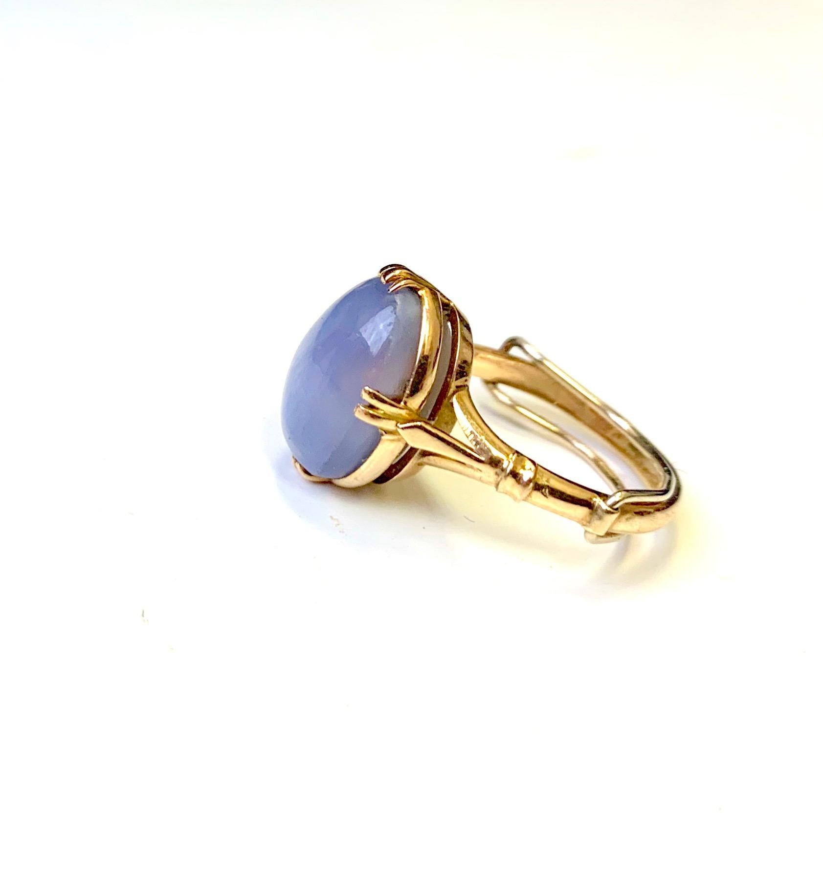 This Victorian star sapphire ring has a center stone that’s oval in shape and cabochon cut. The center stone is a star sapphire which compliments the blush tone of the gold which is in between yellow and rose with its original patina. The ring is