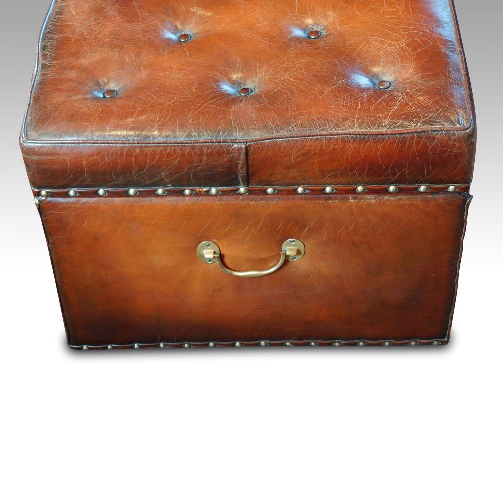 Victorian leather ottoman
This Victorian leather ottoman was made circa 1870.
Originally covered in fabric this ottoman we have covered in fine leather hide with an upholstered buttoned lifting lid. This lid lifts to reveal a full storage area lined