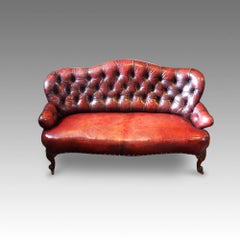 English Victorian deep buttoned red Leather Sofa, 19th century loveseat