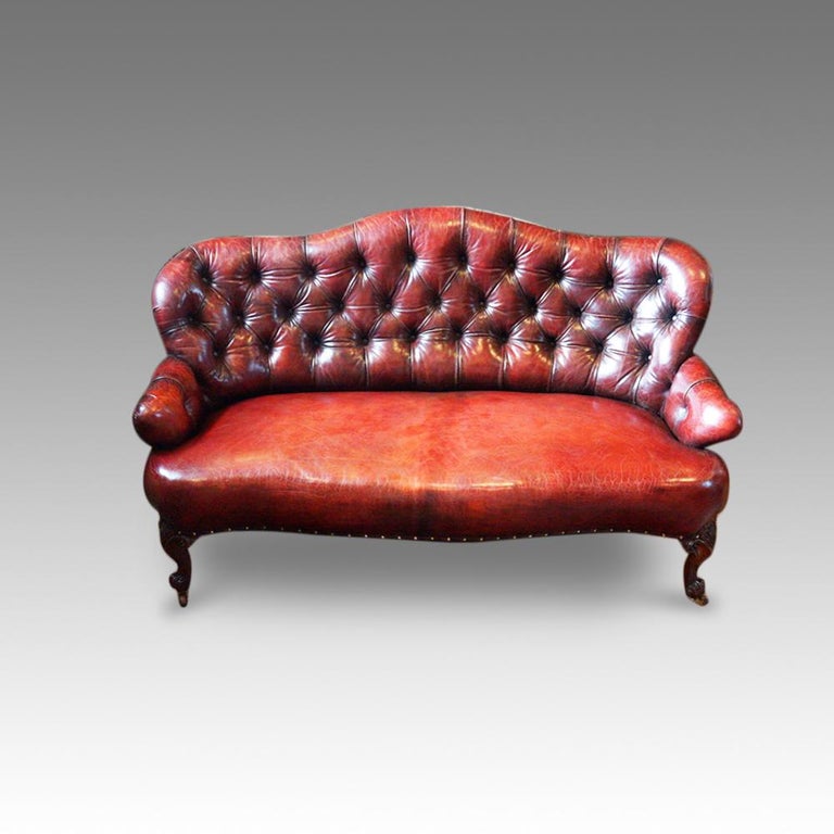 English Victorian deep buttoned red Leather Sofa, 19th century loveseat