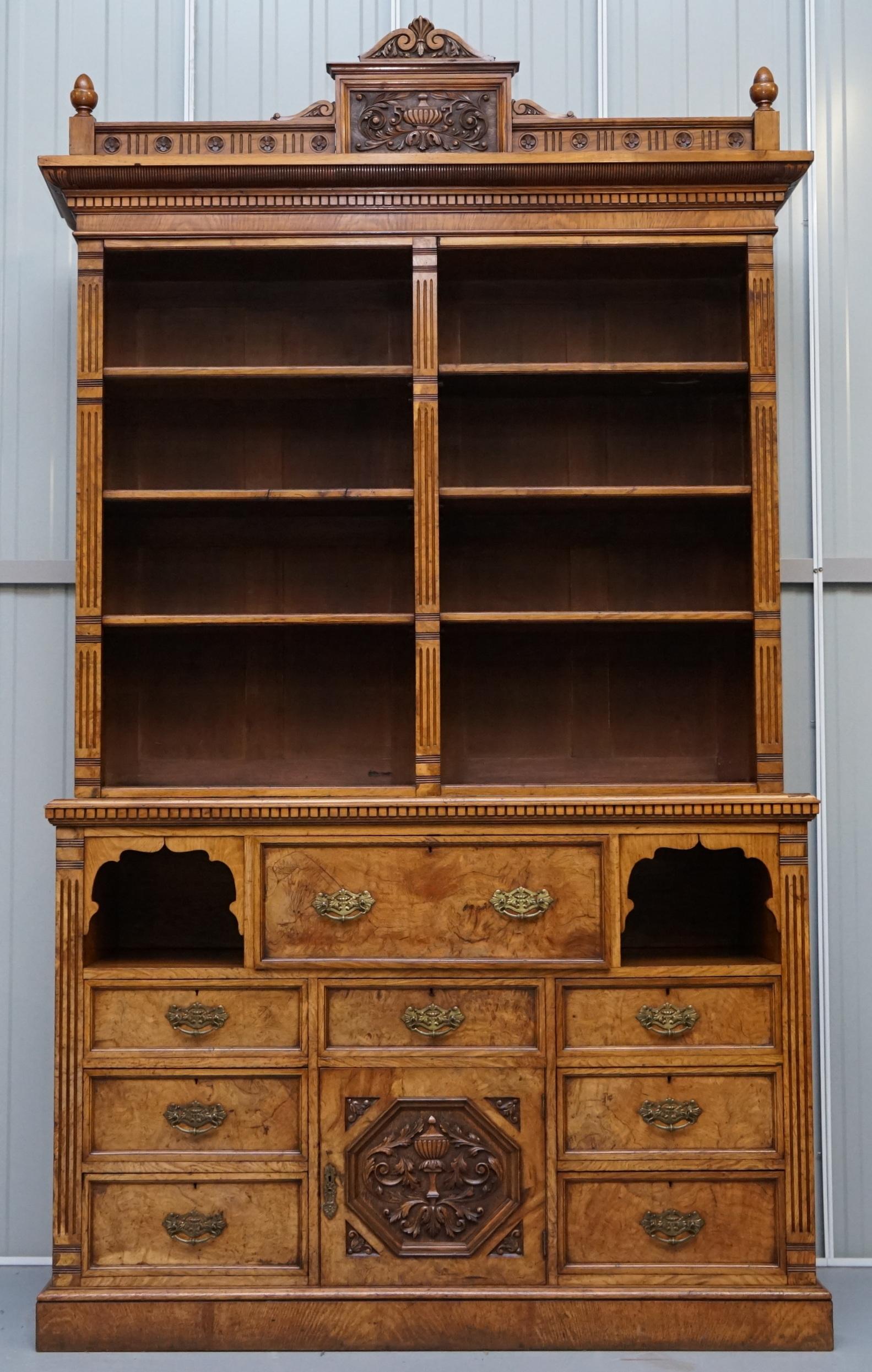 We are delighted to offer for sale this stunning and very rare John Reid & Sons Victorian Library bookcase in Pollard Burr oak with oxblood leather drop front secretaire desk

A very good looking and rare piece, pollard oak is highly collectable