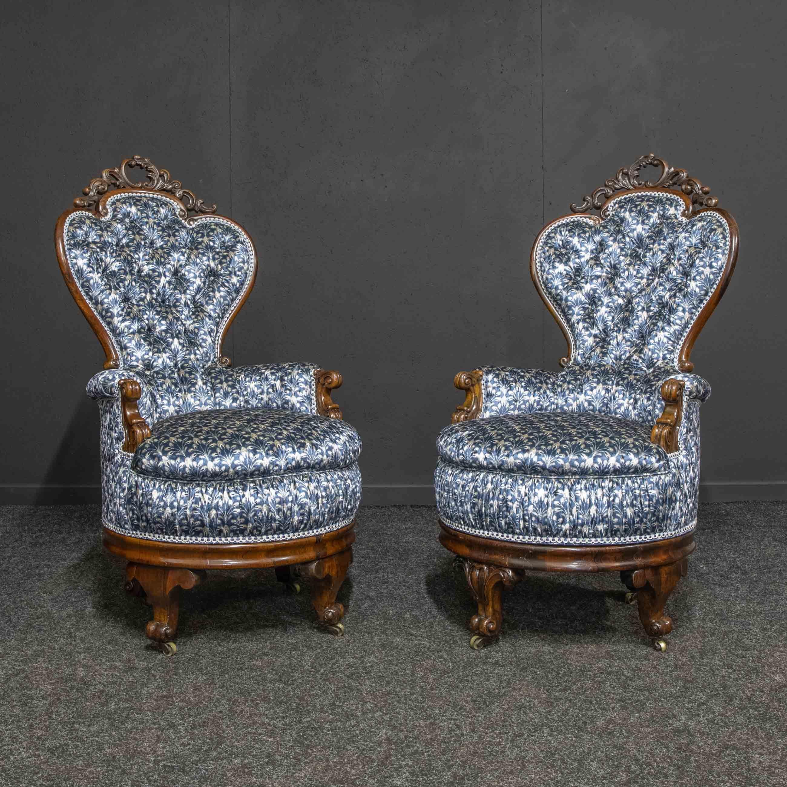 Absolutely stunning and very rare, pair of 19th century rosewood ocean liner chairs that have a holding bracket underneath used when on the waves but at the same time will swivel and whilst at dock can be moved onto the original castors. It is quite