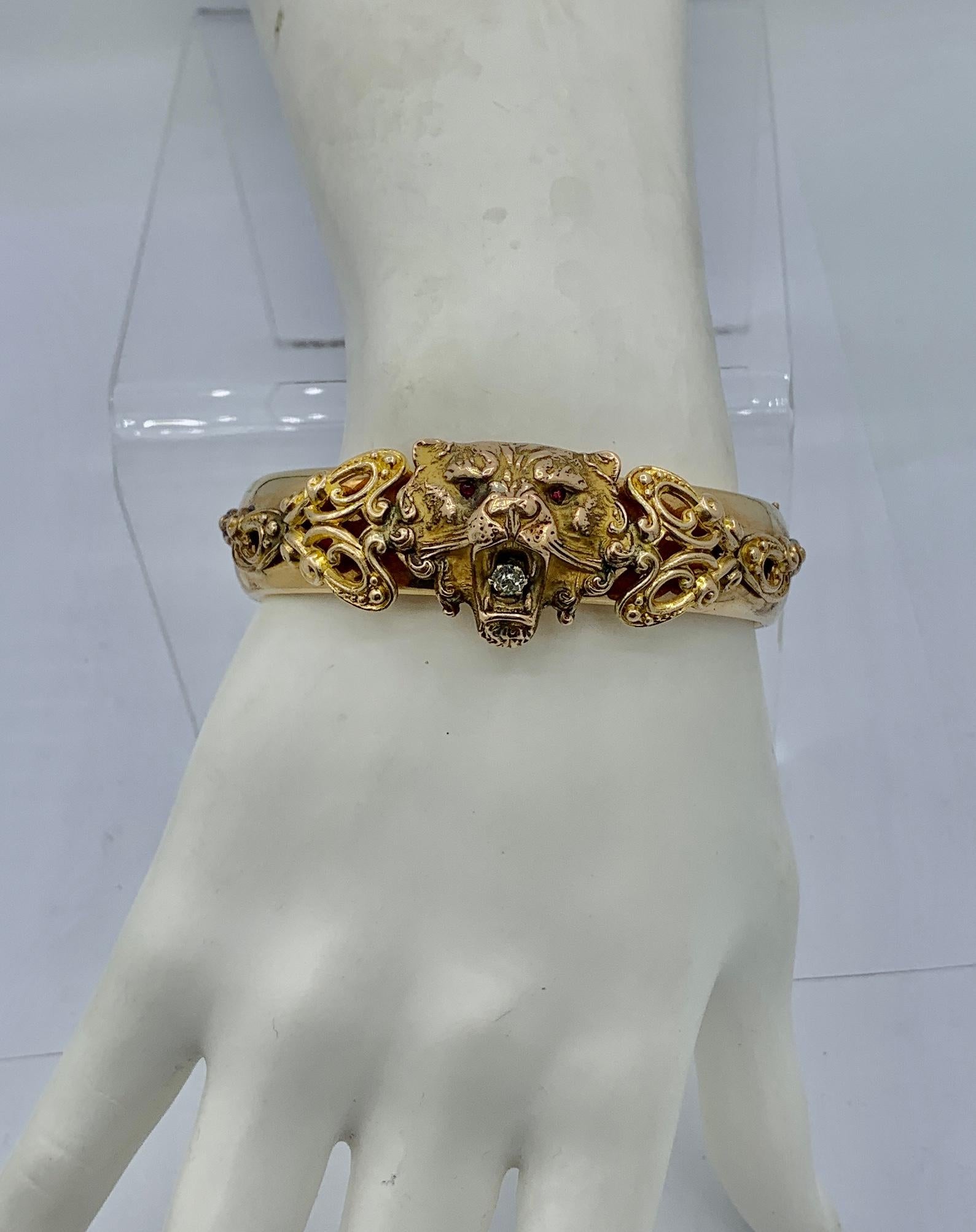 This is a spectacular antique Gold Filled Victorian - Art Nouveau lion, panther, leopard or tiger Bangle Bracelet.  The bracelet has extraordinary three-dimensional design with its fantastic lion head and beautiful applied scroll work.  The bracelet