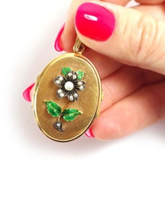 Victorian locket pendant in 18 karat gold and silver