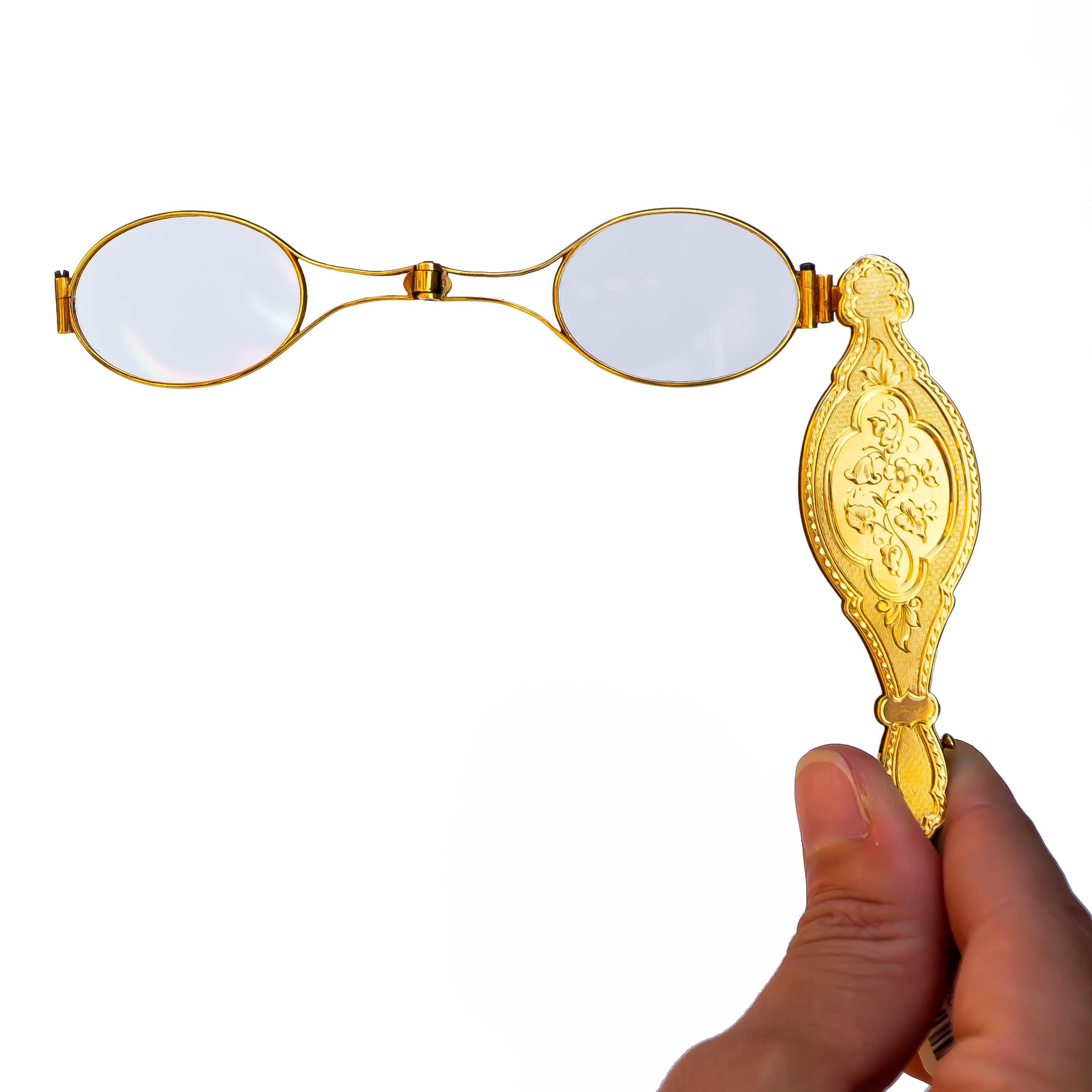 Victorian Lorgnette - was usually used as a piece of jewelry, rather than to enhance vision. Fashionable ladies usually preferred them to spectacles. These were very popular at masquerade parties and used often at the opera.

Metal: 14K Yellow Gold