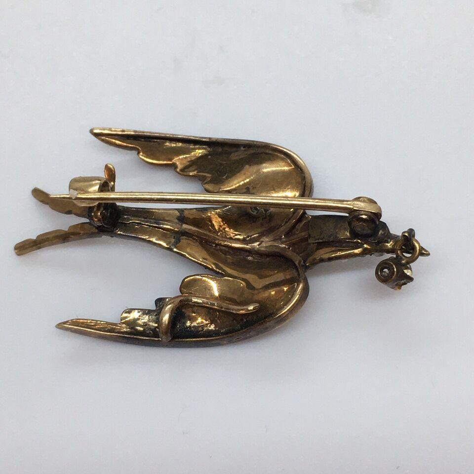 Cabochon Victorian Low Karat Gold Brooch Swallow in Flight Seed Pearls Ruby Diamond 1880s For Sale