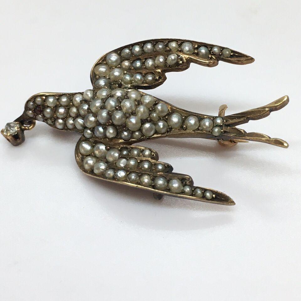 Women's Victorian Low Karat Gold Brooch Swallow in Flight Seed Pearls Ruby Diamond 1880s For Sale