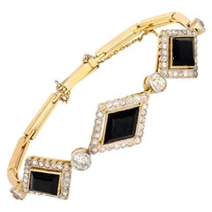 Victorian Lozenge Onyx and Diamond Bracelet in 18 Karat Gold, circa 1900