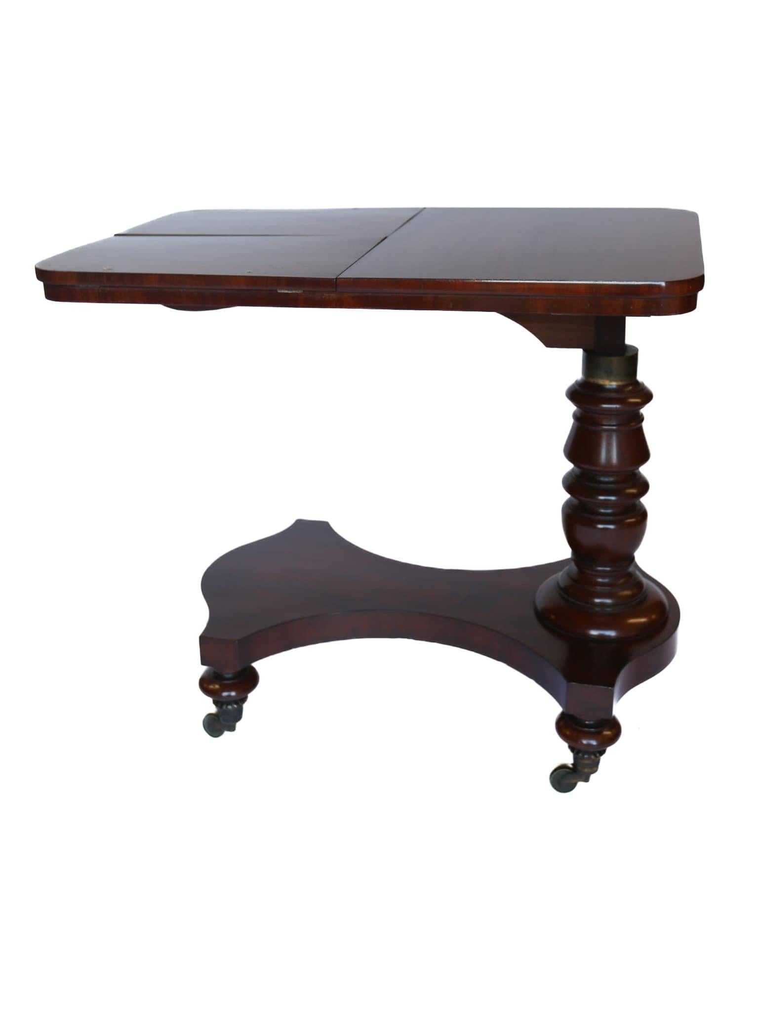 Victorian Mahogany double lectern Reading Table / music table ,
1830s
Designed to sit under a bed either side, or Library Chair,
  for  two Musicians in a room,
Telescopic column with brass plate at side with holes, to hold
Brass pin for adjusting