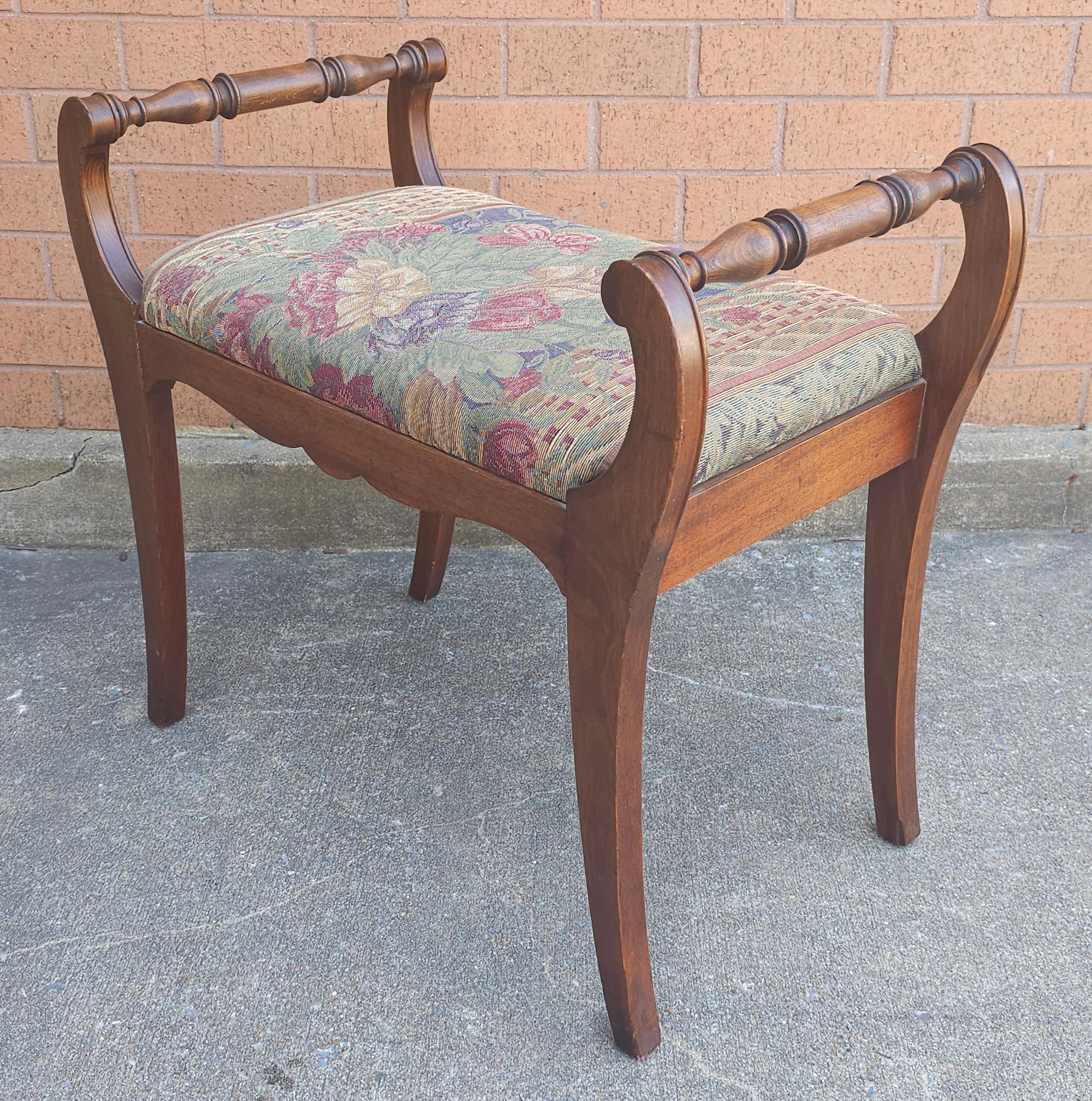 A Victorian Mahogany and Tapestry Upholstered Bench in good vintage condition. Measures 26
