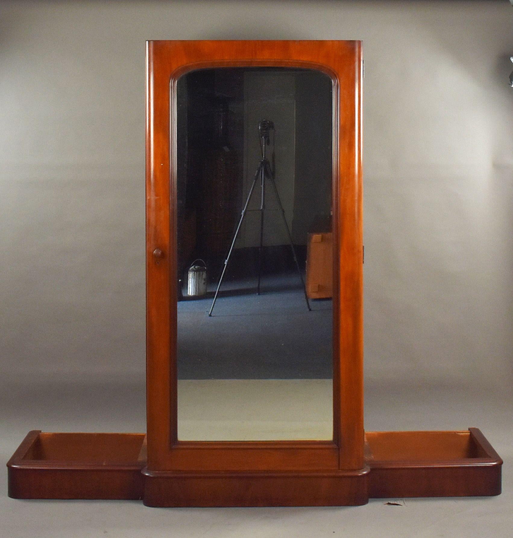 Victorian Mahogany Triple Wardrobe
Item Code: 1389
A superb quality Victorian mahogany triple wardrobe of generous proportions and excellent colour. The central mirrored door is flanked by two panelled doors with moulded edges and rounded corners,