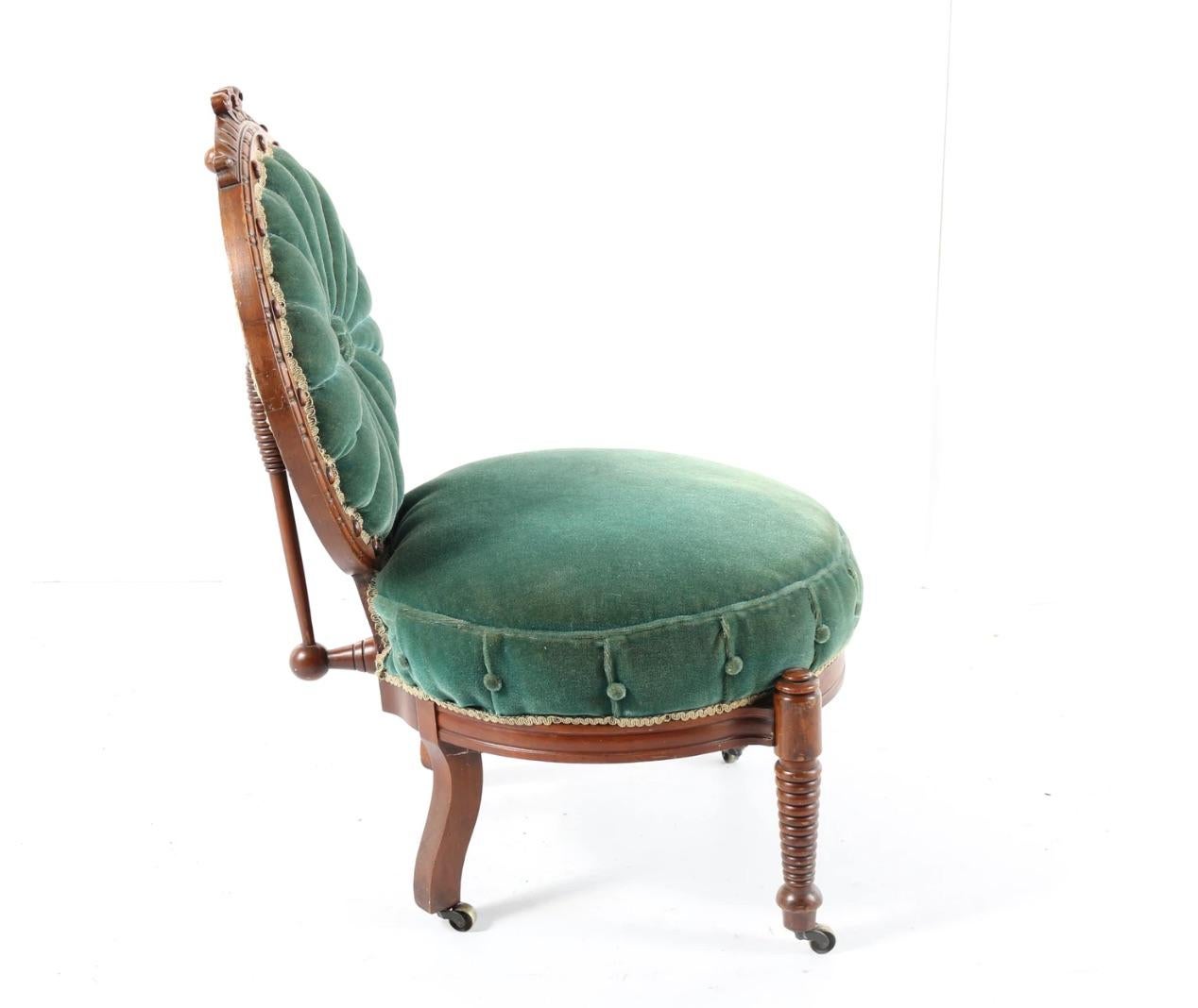 Victorian Mahogany Carved Balloon Back Velvet Chair on Casters For Sale 1