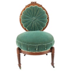 Victorian Mahogany Carved Balloon Back Velvet Chair on Casters