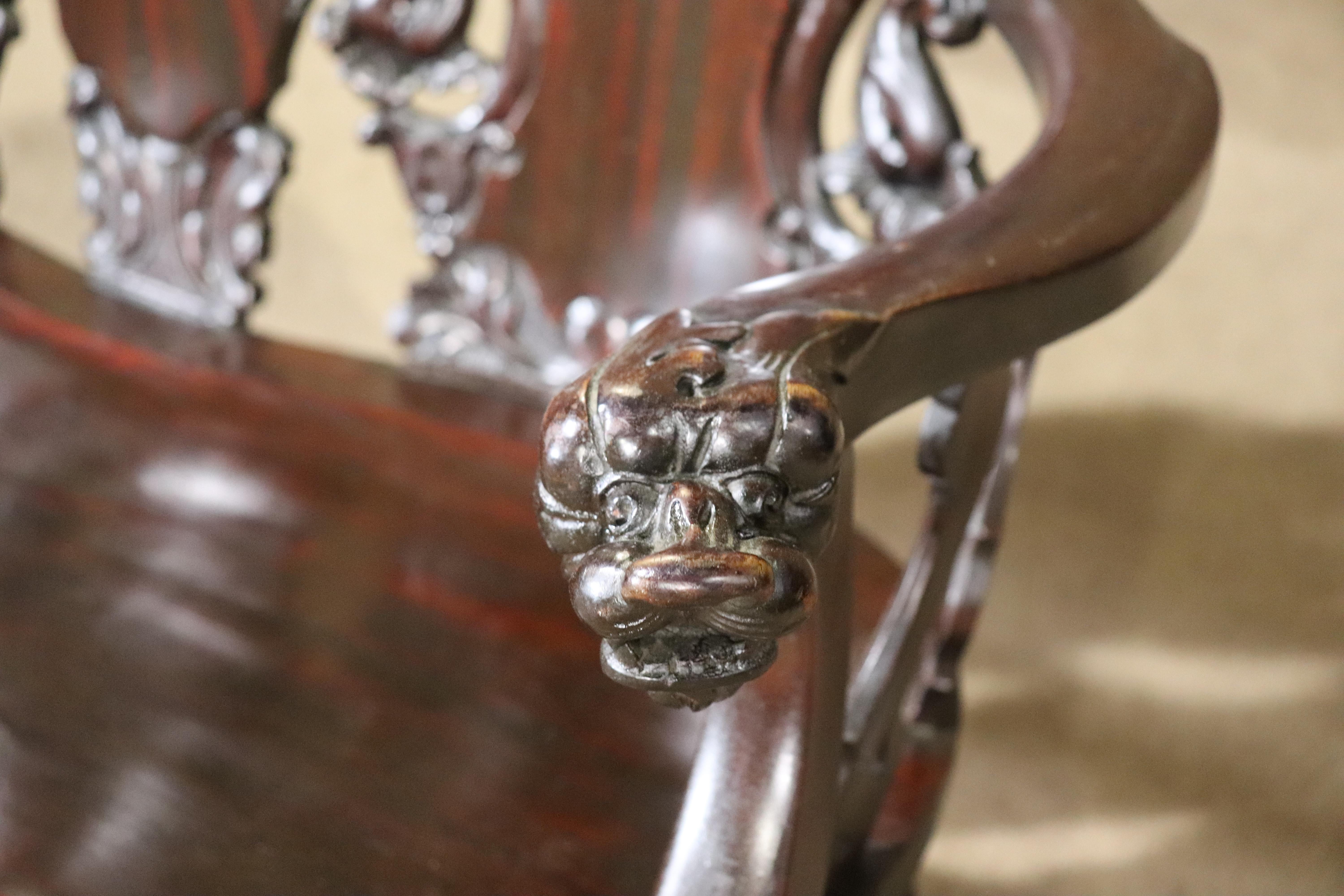 Antique double seat bench made of rich mahogany wood. Beautifully hand sculpted carvings throughout the bench. Claw feet, griffin arm rests, intricate back panels, all with gorgeous flaming grain running through.
Please confirm location NY or NJ