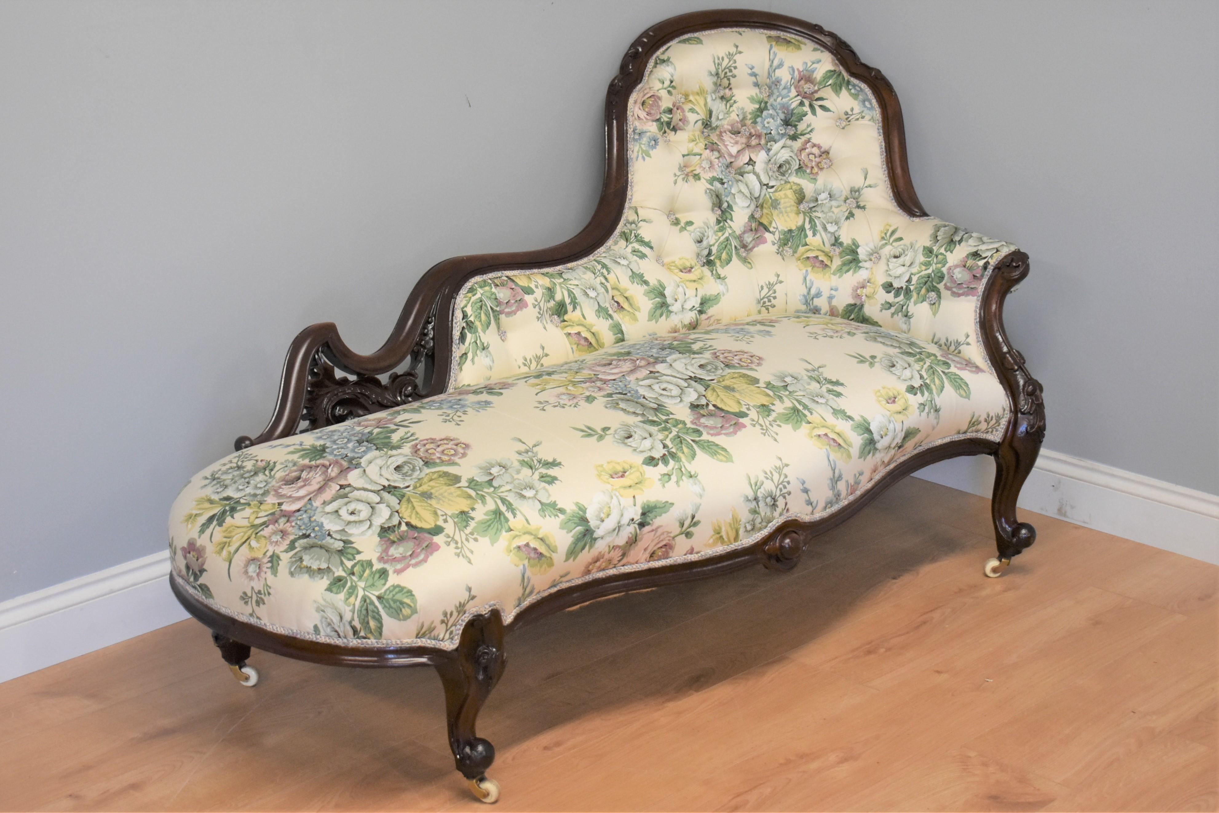 Victorian mahogany chaise longue in very nice condition, the frame has carved scrolls and stands on cabriole legs with castors. The chaise is upholstered in vintage Sanderson 'knowle' pattern satin fabric and in lovely condition.