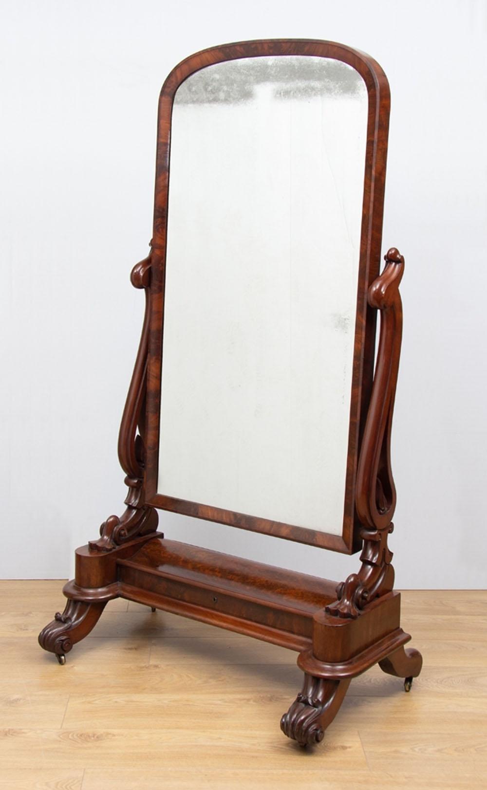 Some foxing to top of mirror. Please refer to images
Scrolling legs and carved supports
Lidded storage area in base for vanity items
Bevelled frame

The 'Cheval' mirror takes its name from the French word for horse, in reference to the