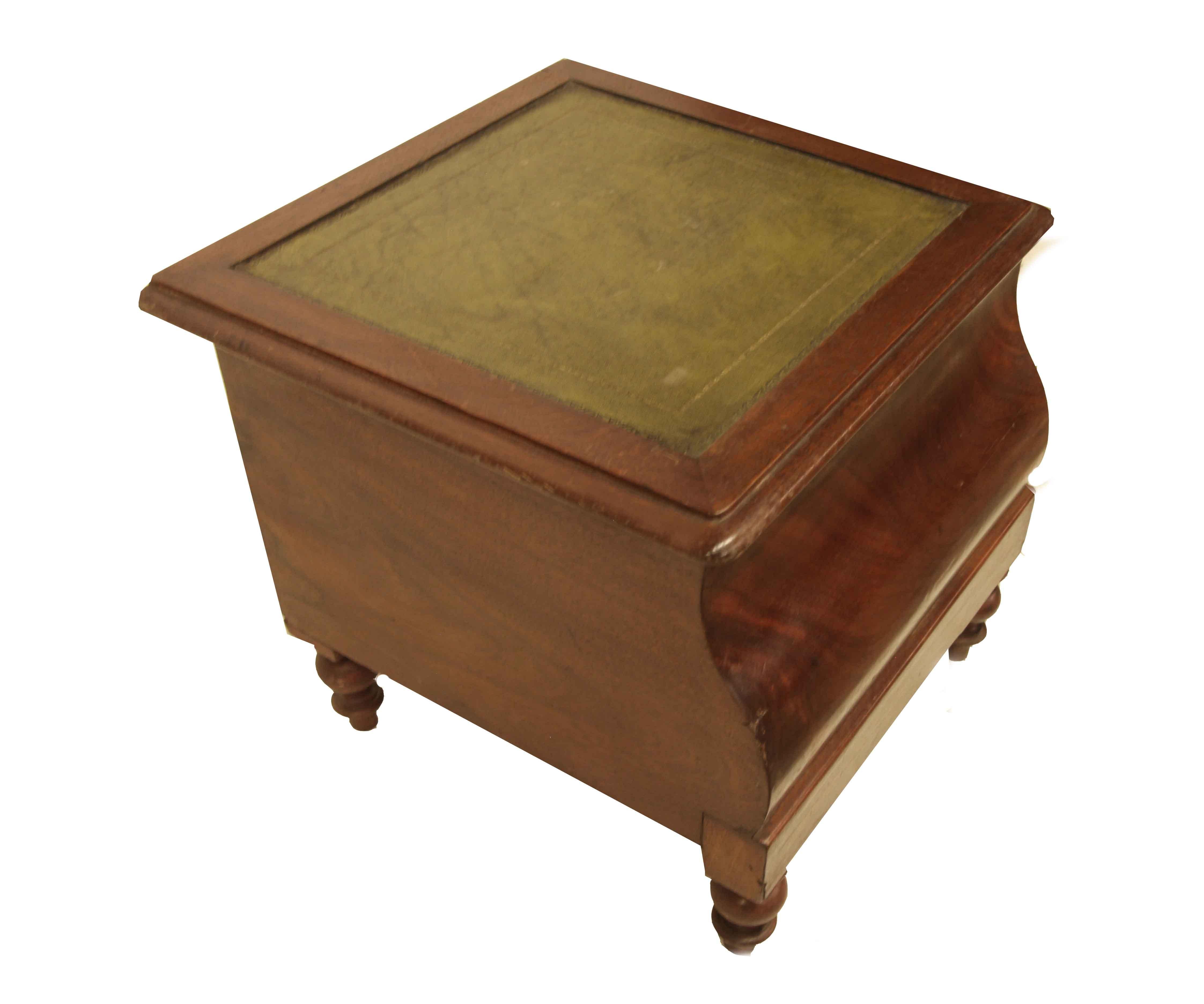 Victorian mahogany commode,  this piece has been converted from a commode; it can serve as a small side stand or stool. It has a tooled leather insert on the top (not original) surrounded by a band of mahogany that lifts to reveal a fitted lift out