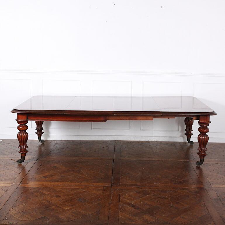 Victorian mahogany crank style dining table with two leaves. 
Length without leaves: 58
