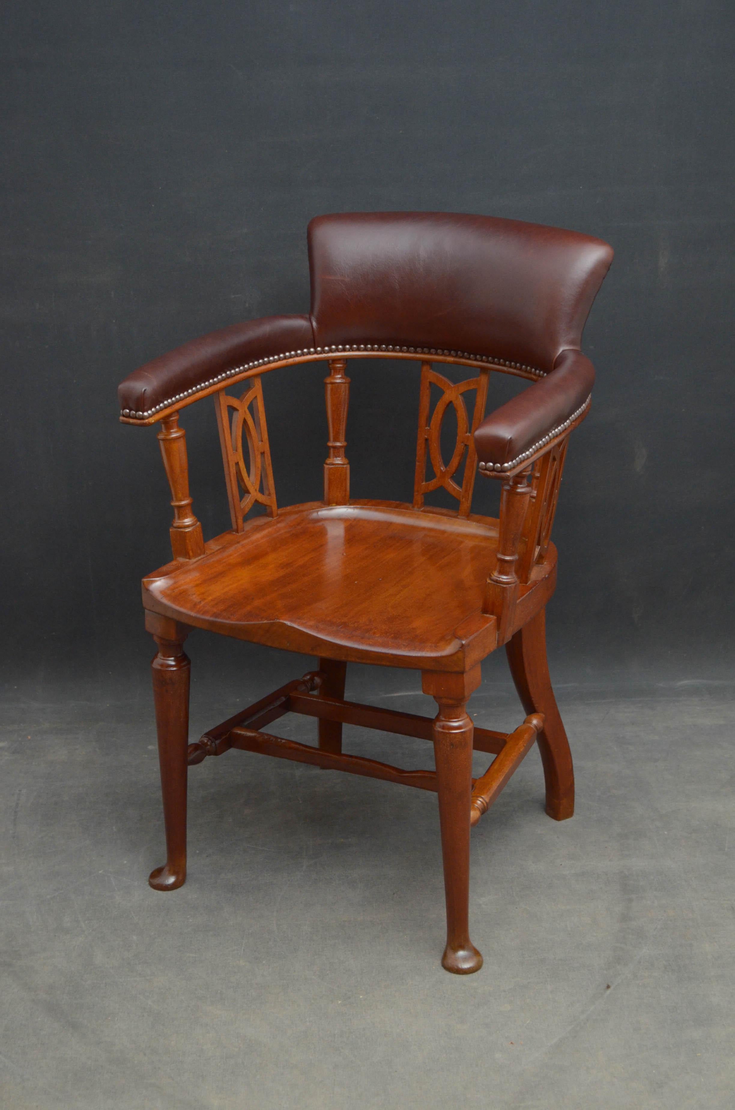 Sn4642 Victorian solid mahogany office chair, having shaped top rail and open arms upholstered in fine quality brown leather with closely studded edge on shaped and turned supports, generous seat and turned legs terminating in pad feet, all united