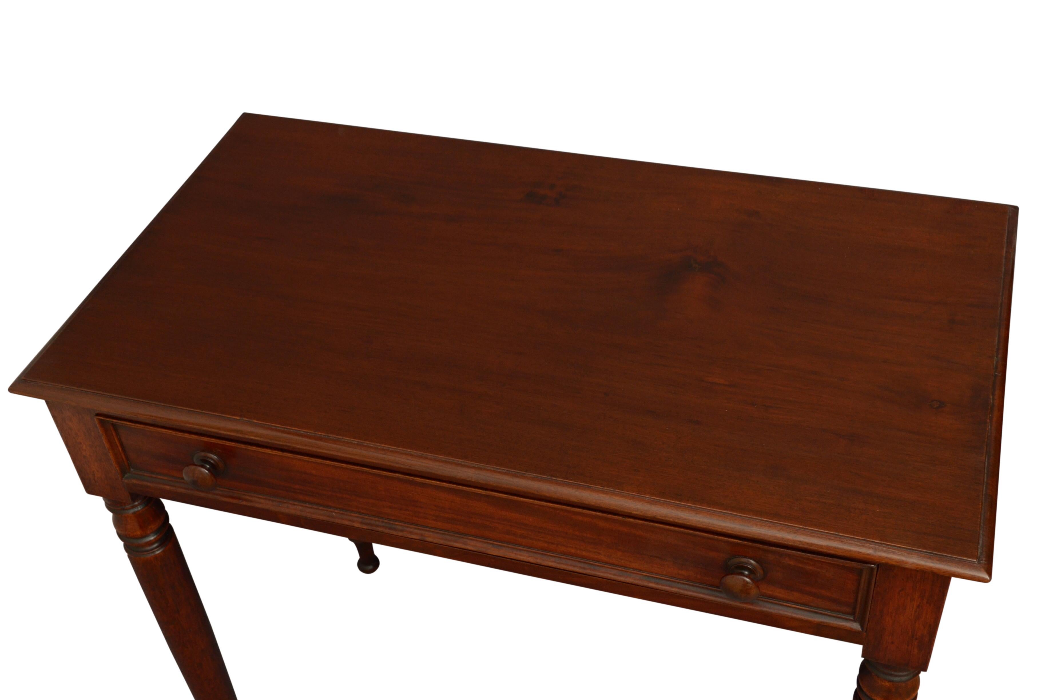 P0133 simple and elegant Victorian side table or a lamp table, having solid mahogany top with moulded edge above an oak lined moulded drawer fitted with original turned knobs, all standing on turned and carved legs. This antique table would make a