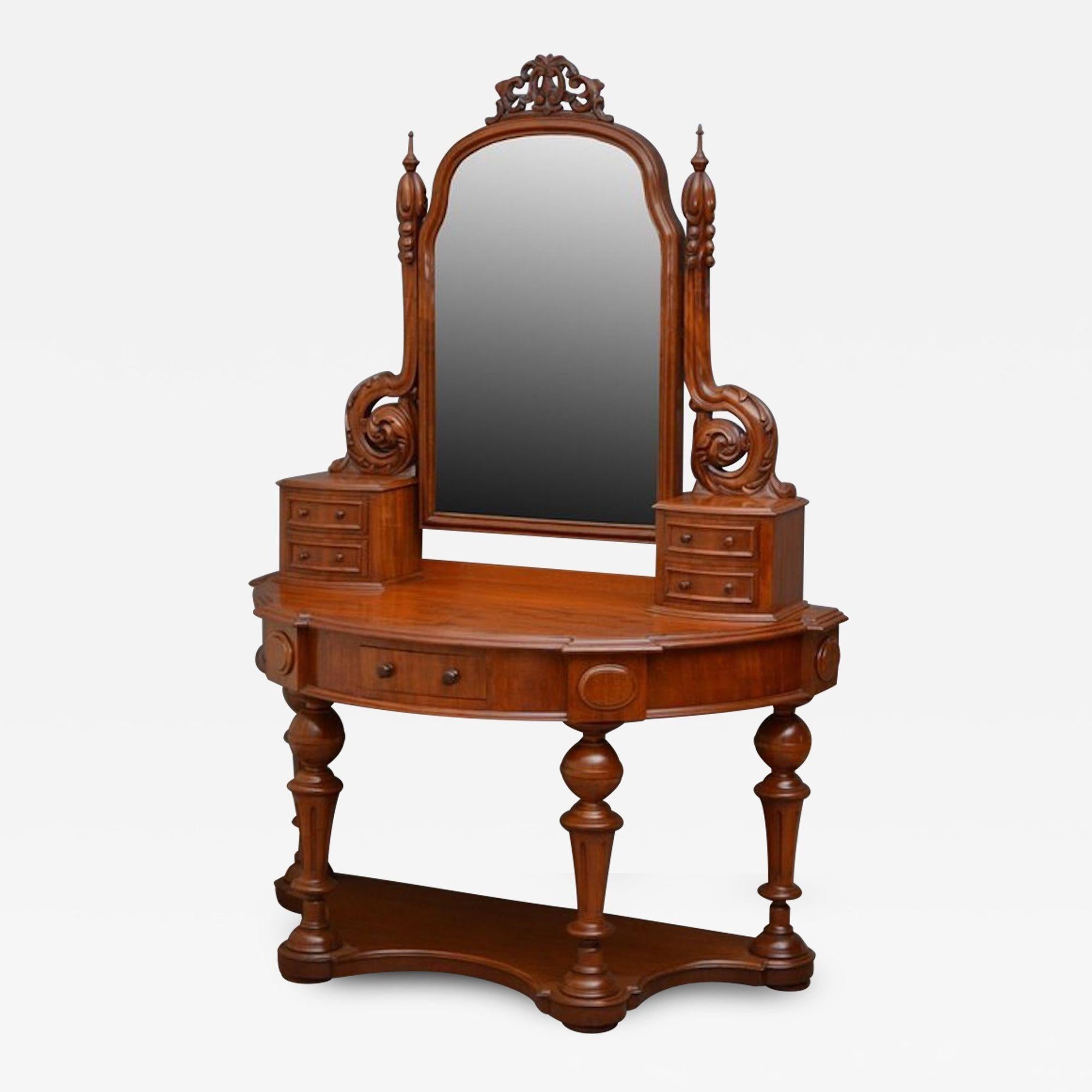 Sn3683, excellent Victorian mahogany dressing table, duchess Stand, having original mirror plate in shaped and moulded frame with carving to top, finely carved supports terminating in small bowed and moulded drawers, fitted with original turned