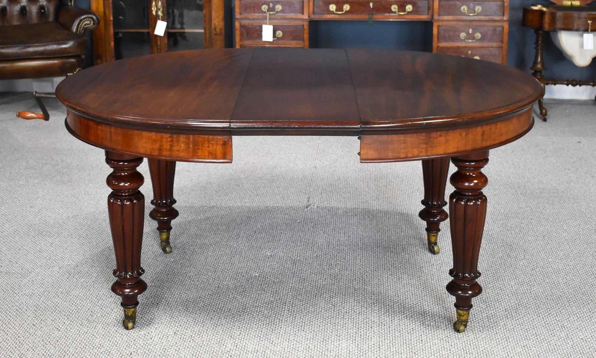 For sale is a good quality Victorian mahogany extending dining table, circular when closed, extending with one leaf to on oval table, standing on elegantly turned and reeded legs, terminating on original castors. The table is in very good condition,