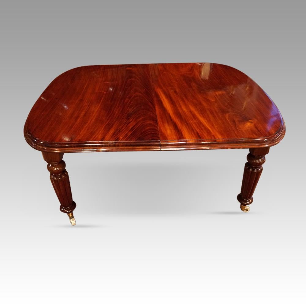 Victorian mahogany extending dining table
This Victorian mahogany extending dining table was made circa 1870.
The cabinetmaker selected mahogany that was or beautiful colour and a most interesting grain.
The table extends easily by using the winding