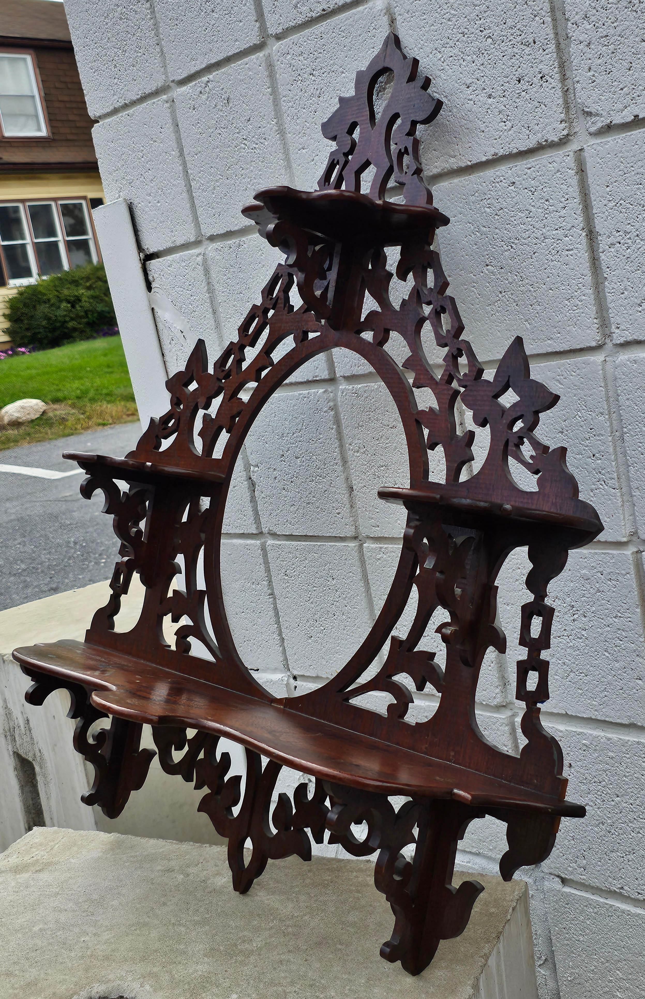 An early 20th Century,  Very fine Victorian Mahogany Fretwork Three Tier Wall Shelf in very good antique condition. Measures 30.75