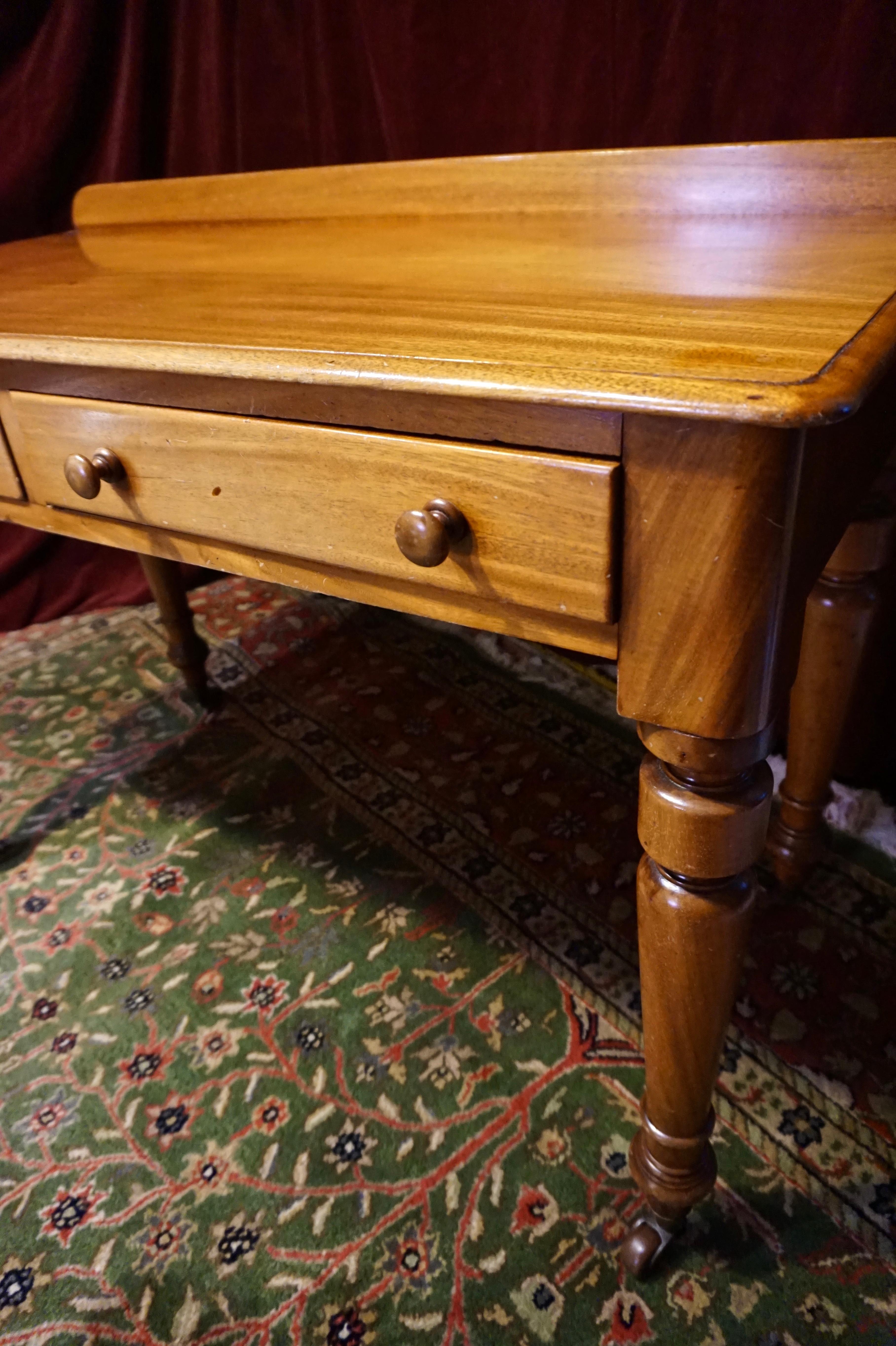 Hand-Crafted Colonial Mahogany Handmade Writing Table Cum Console On Porcelain Castors For Sale