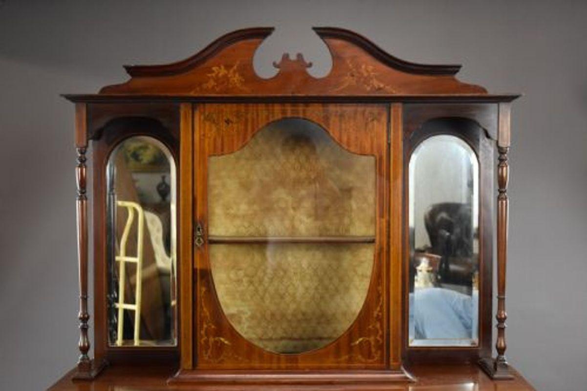 For sale is a Victorian mahogany inlaid cabinet, remaining in good condition, showing minor signs of wear commensurate with age and use.

Measures: Width: 122cm Depth: 39cm Height: 199cm.