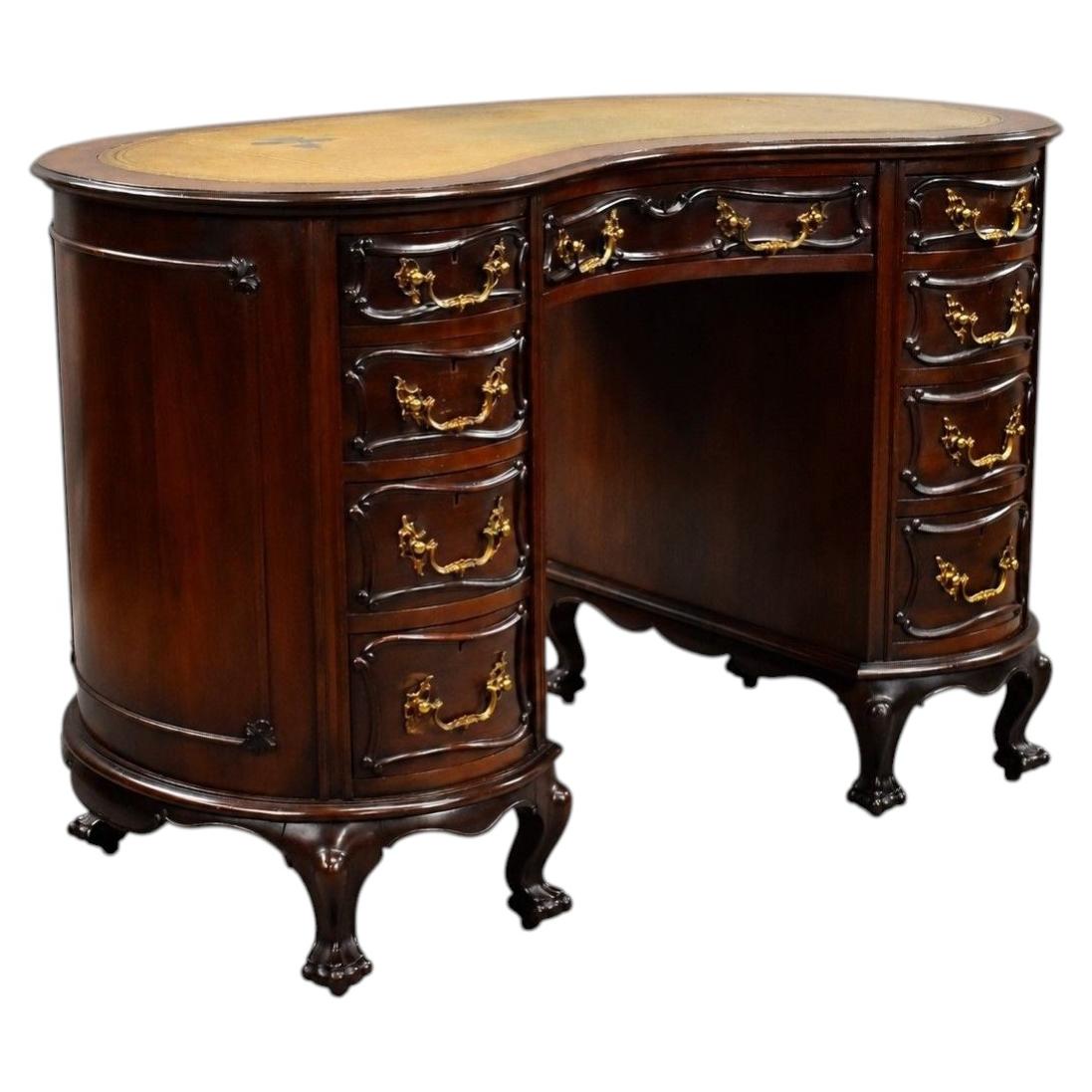 Bureau victorien en acajou, de forme rénale