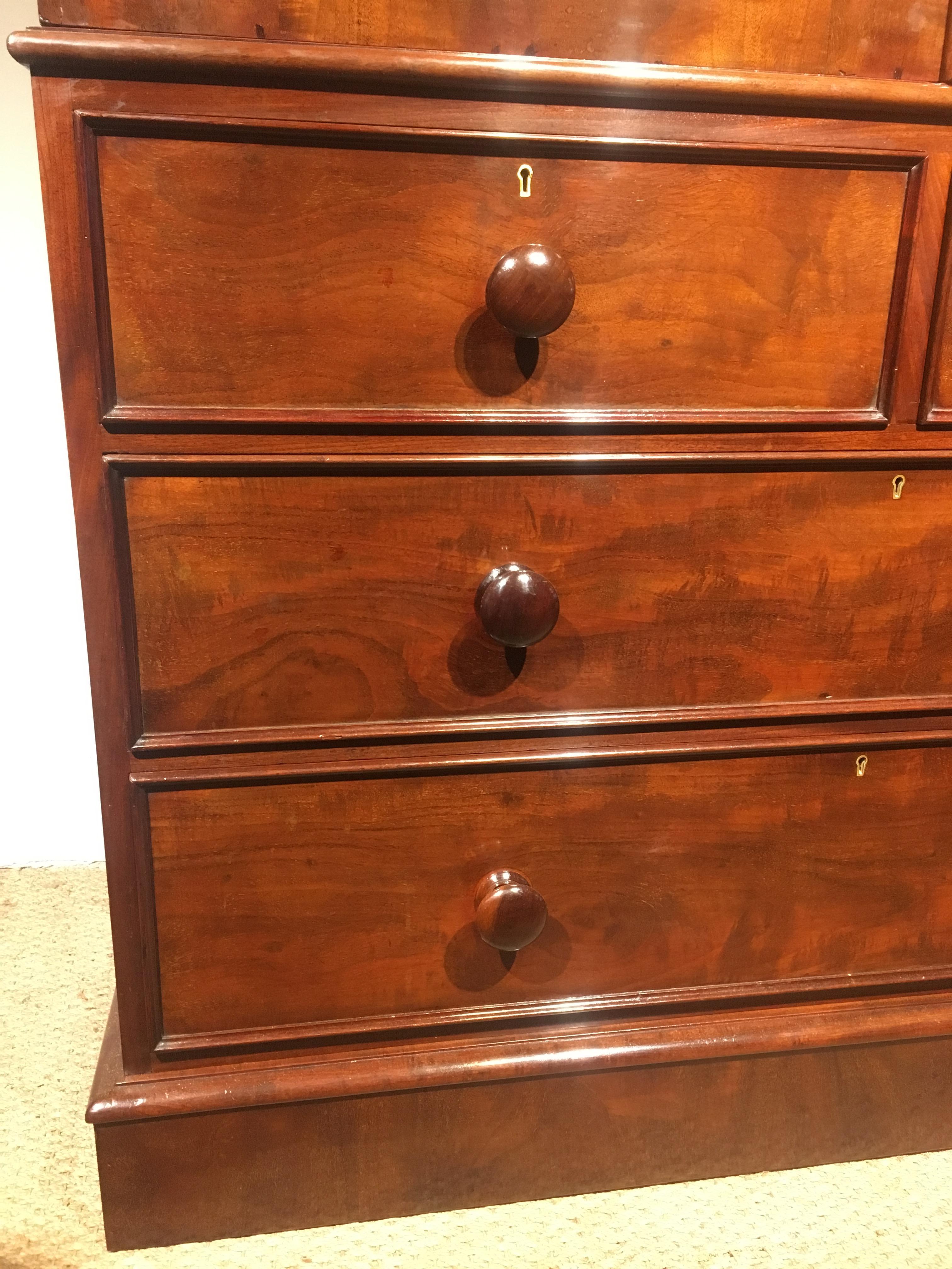 English dating to circa 1860s, with all its original slides retaining its turned wooden knobs.

This piece comes into 3 pieces for ease of transportation / delivery, it has been through our workshops cleaned and polished, the drawers run smoothly