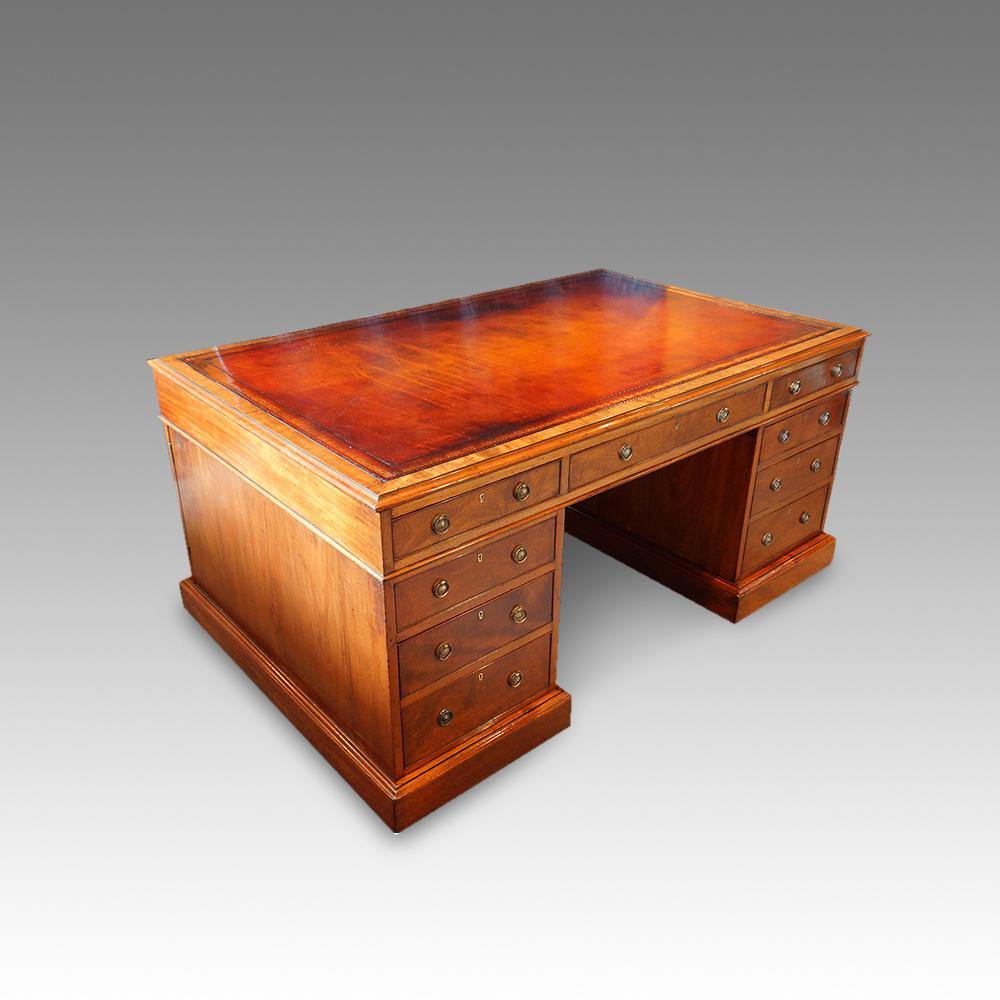 Victorian mahogany partners desk
This Victorian mahogany partners desk was made circa 1860.
This antique desk has the normal 9 drawers to the front and 3 drawers and a pair of cupboards to the rear.
It was made in 3 parts for ease of