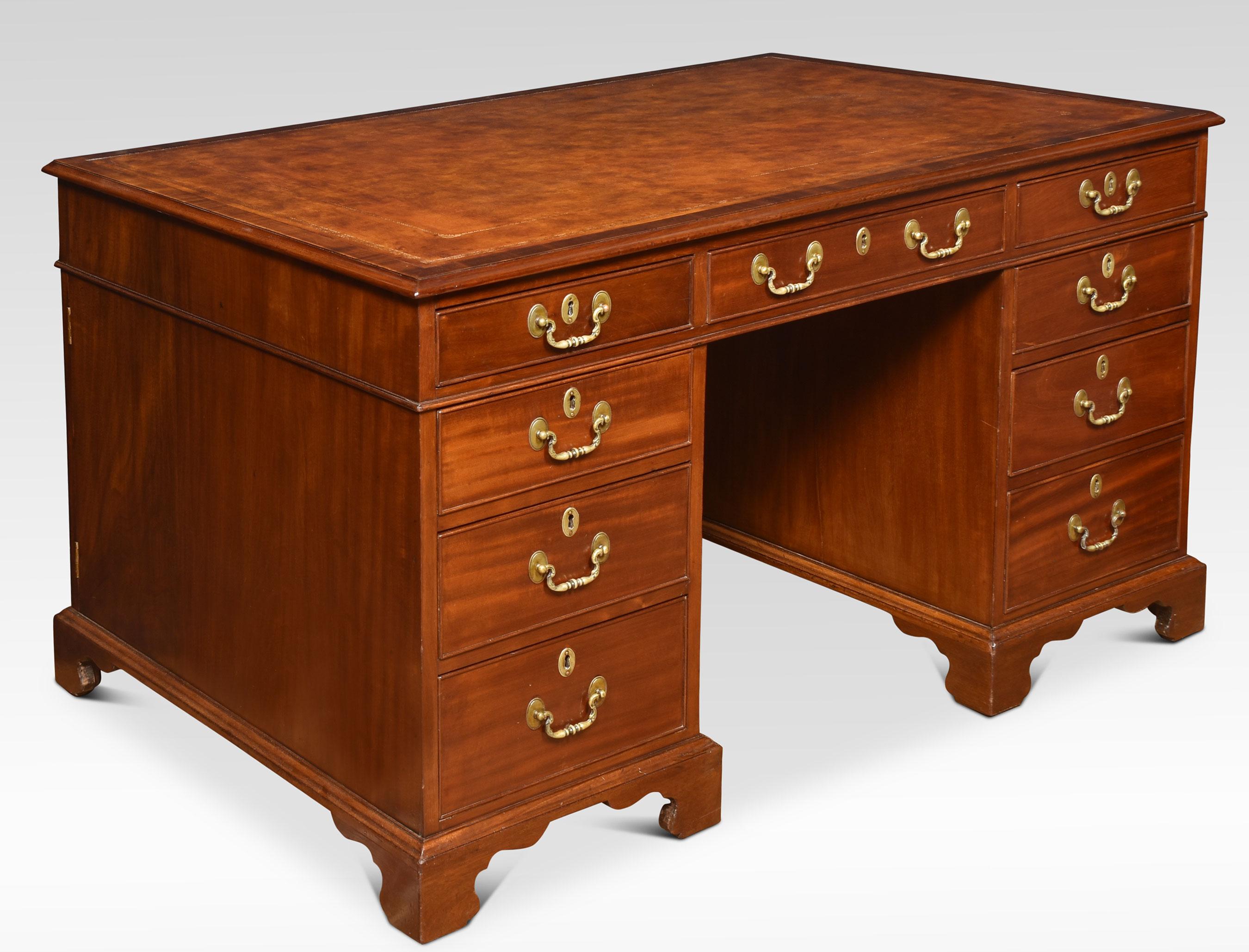 Victorian mahogany partners desk the rectangular top with inset leather having tooled border enclosed by a moulded edge over an arrangement of three freeze drawers. Above two pedestals one side with two banks of three drawers the opposing side
