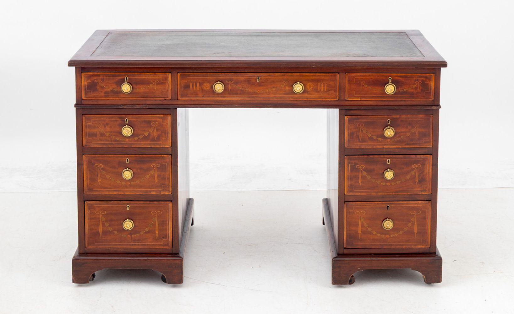 Victorian Mahogany Pedestal Desk, late 19th century, with green leather top have three drawers above two pedestals supports, each with four drawers. 30.5