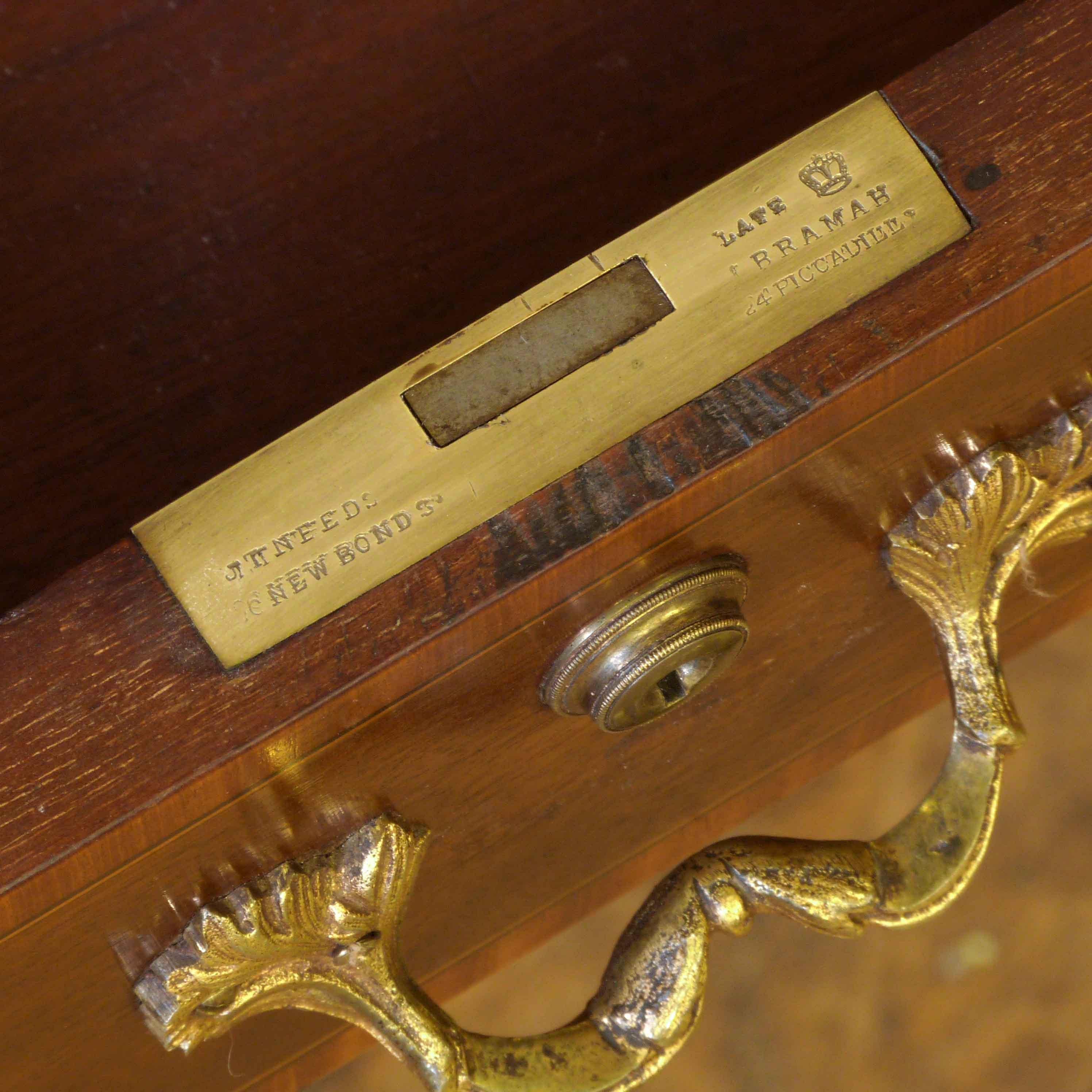 This is one of the finest roll top desks ever made, circa 1890, and in fantastic condition. Satinwood and ebony crossbanded to all sides (including the rear). Ormolu handles throughout and with solid mahogany drawer linings and pigeon holes. The