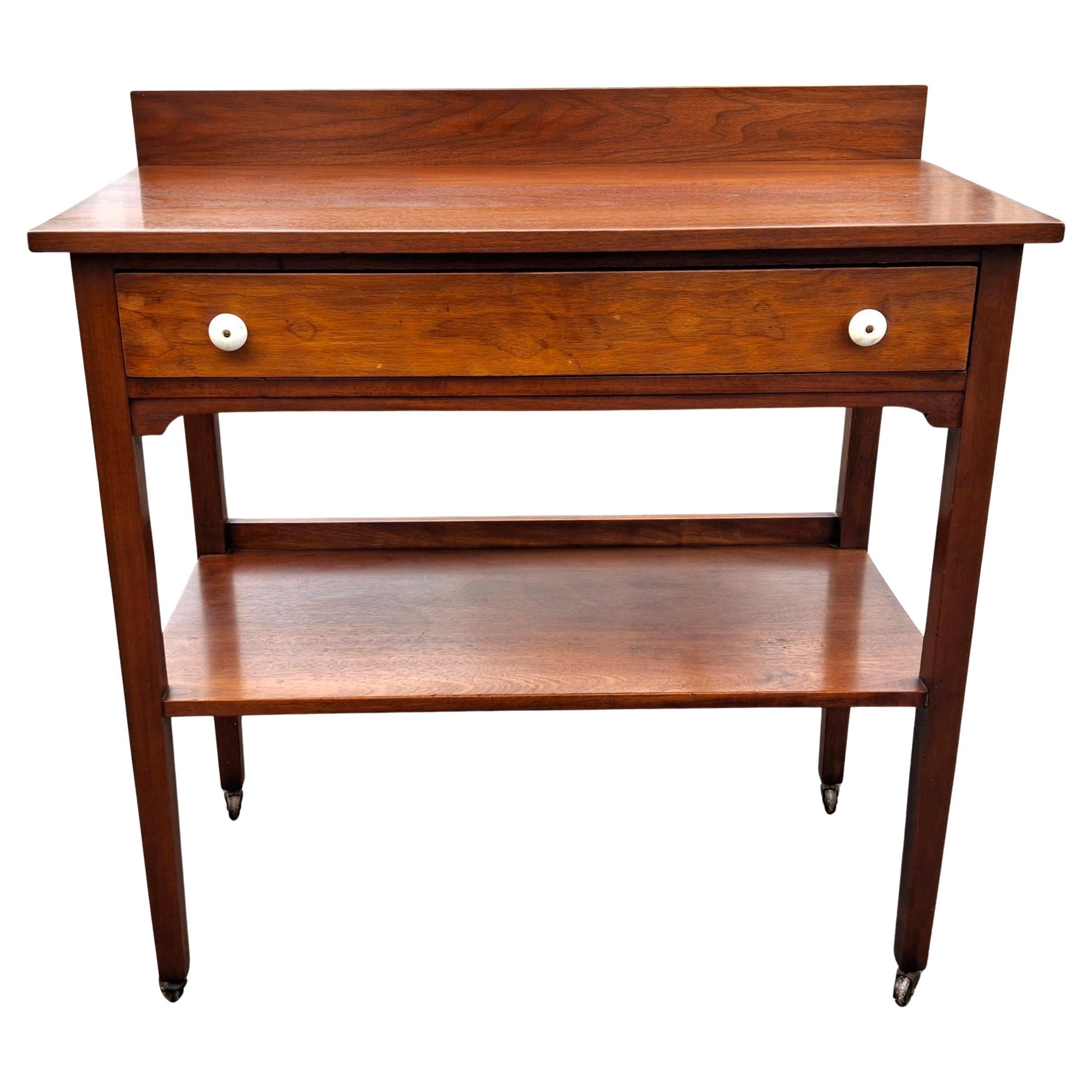 A Victorian Mahogany Rolling Server, 2nd Half 19th Century
Measures 36