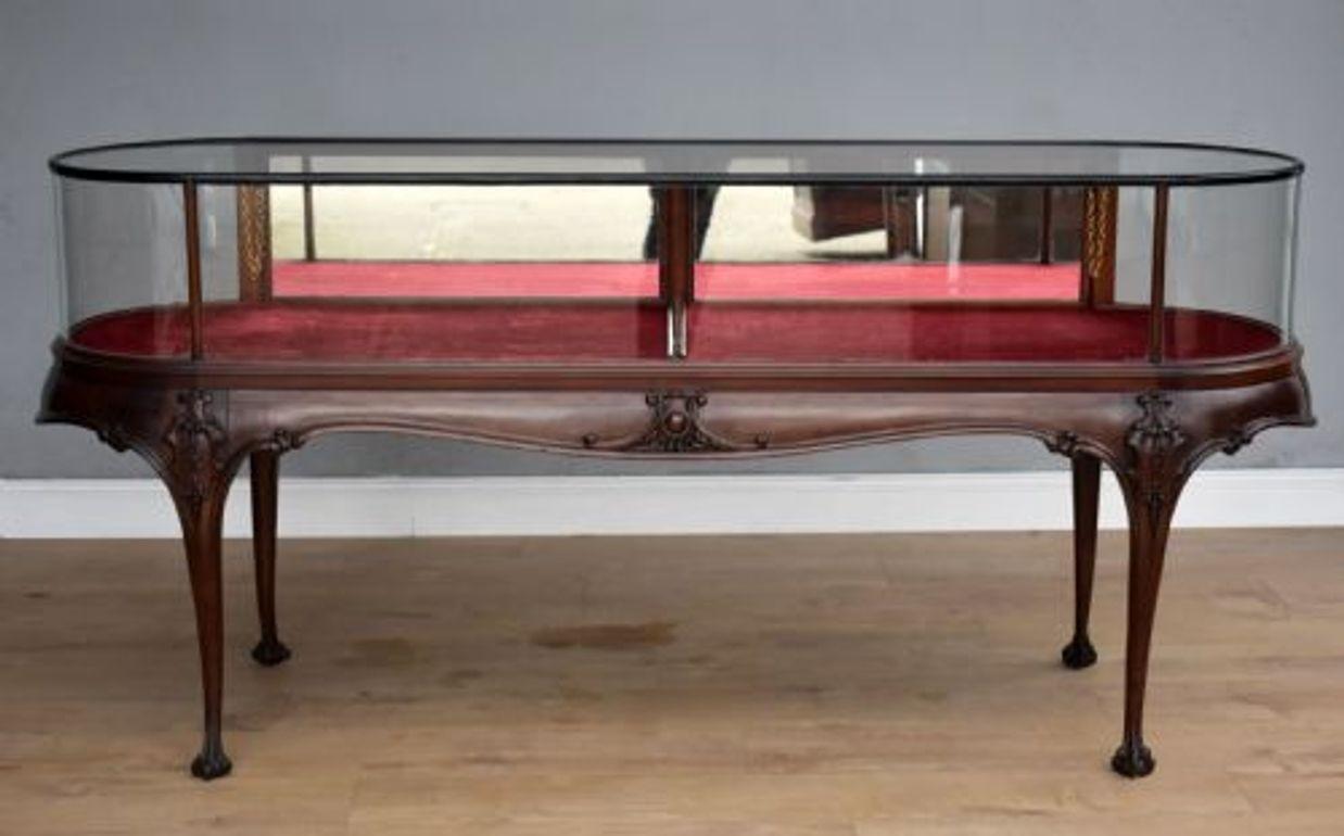 Victorian Mahogany Shop Display Cabinet
Item Code: S26-158
A striking Victorian mahogany display cabinet of grand proportions, ideal for retail presentation or elegant interior showcasing. This exquisite piece features a gracefully curved glazed top
